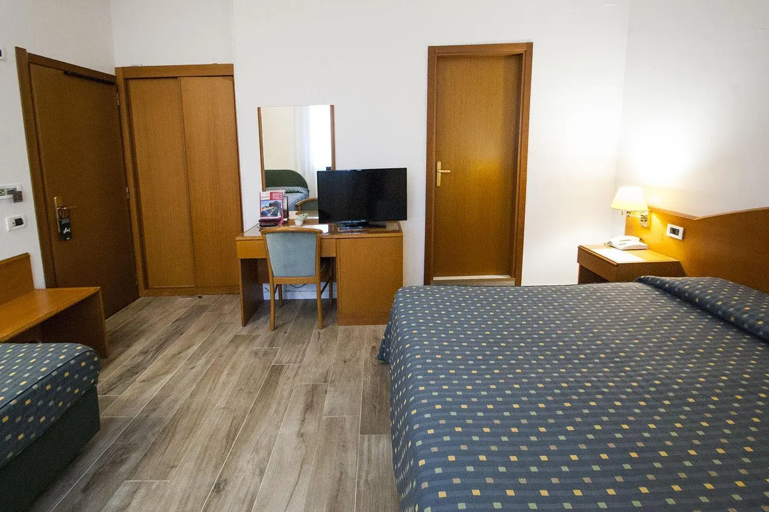 Triple Room in Hotel Italia Triple Room in Hotel Italia