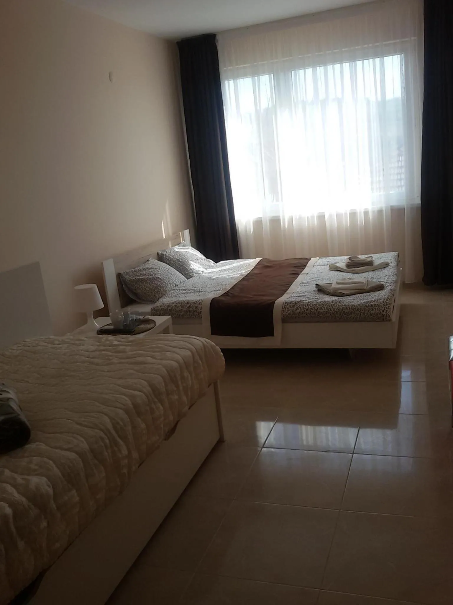 Bed in Sandanski Peak Guest Rooms