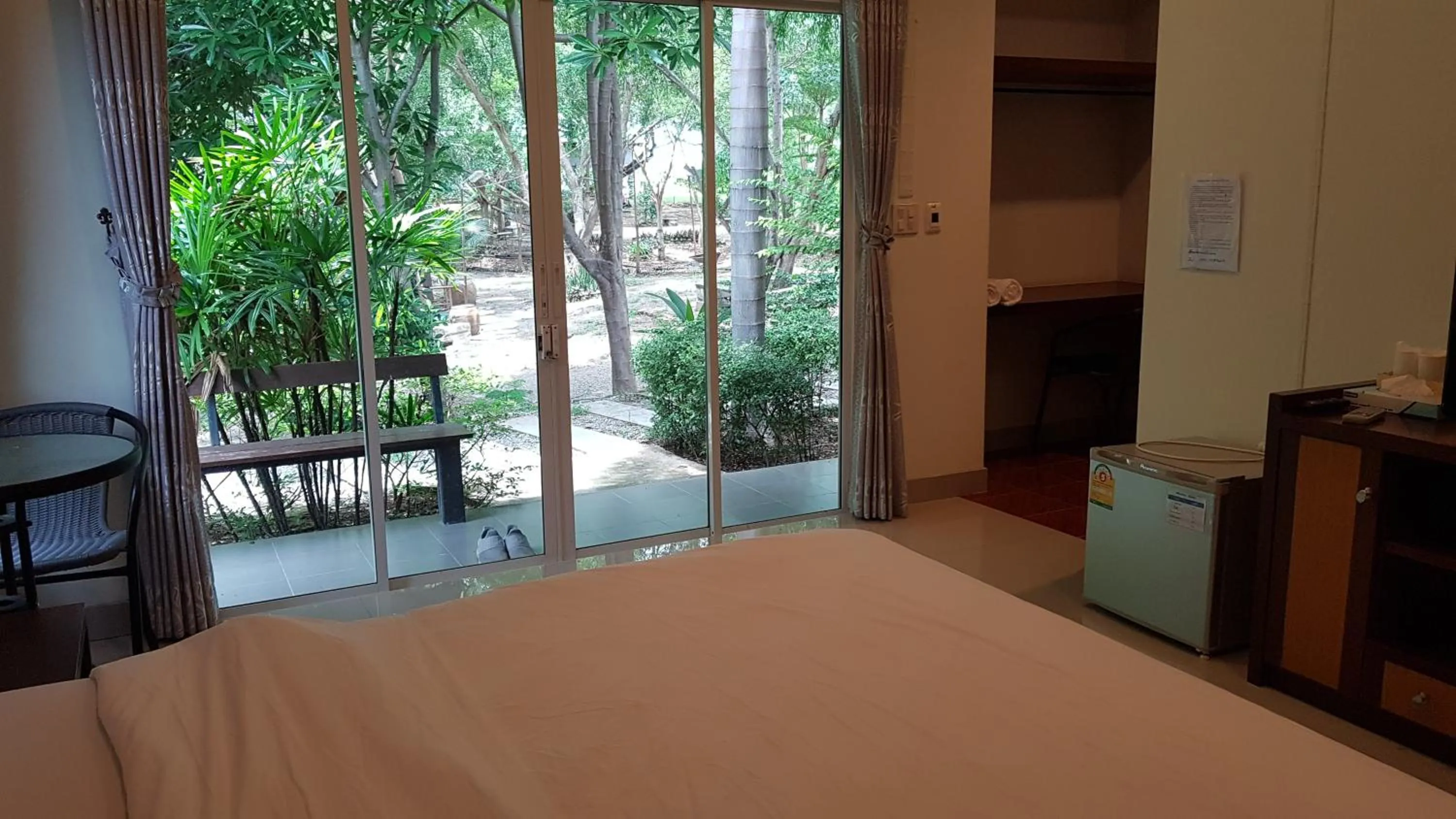 Bed in ที รีสอร์ท T Resort Suphanburi