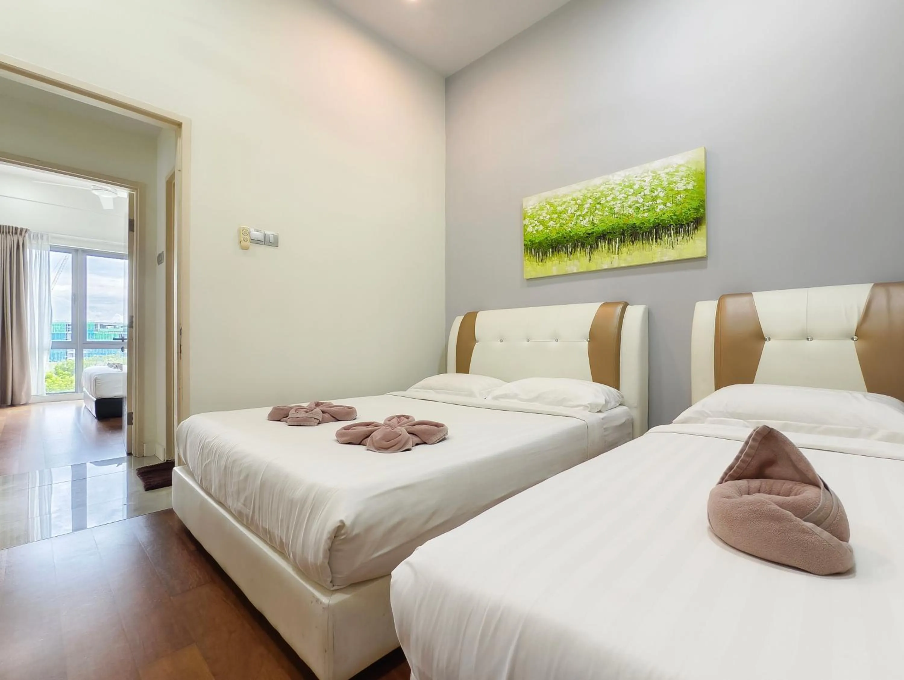 Bed in AJ Suites @ Loft Imago KK