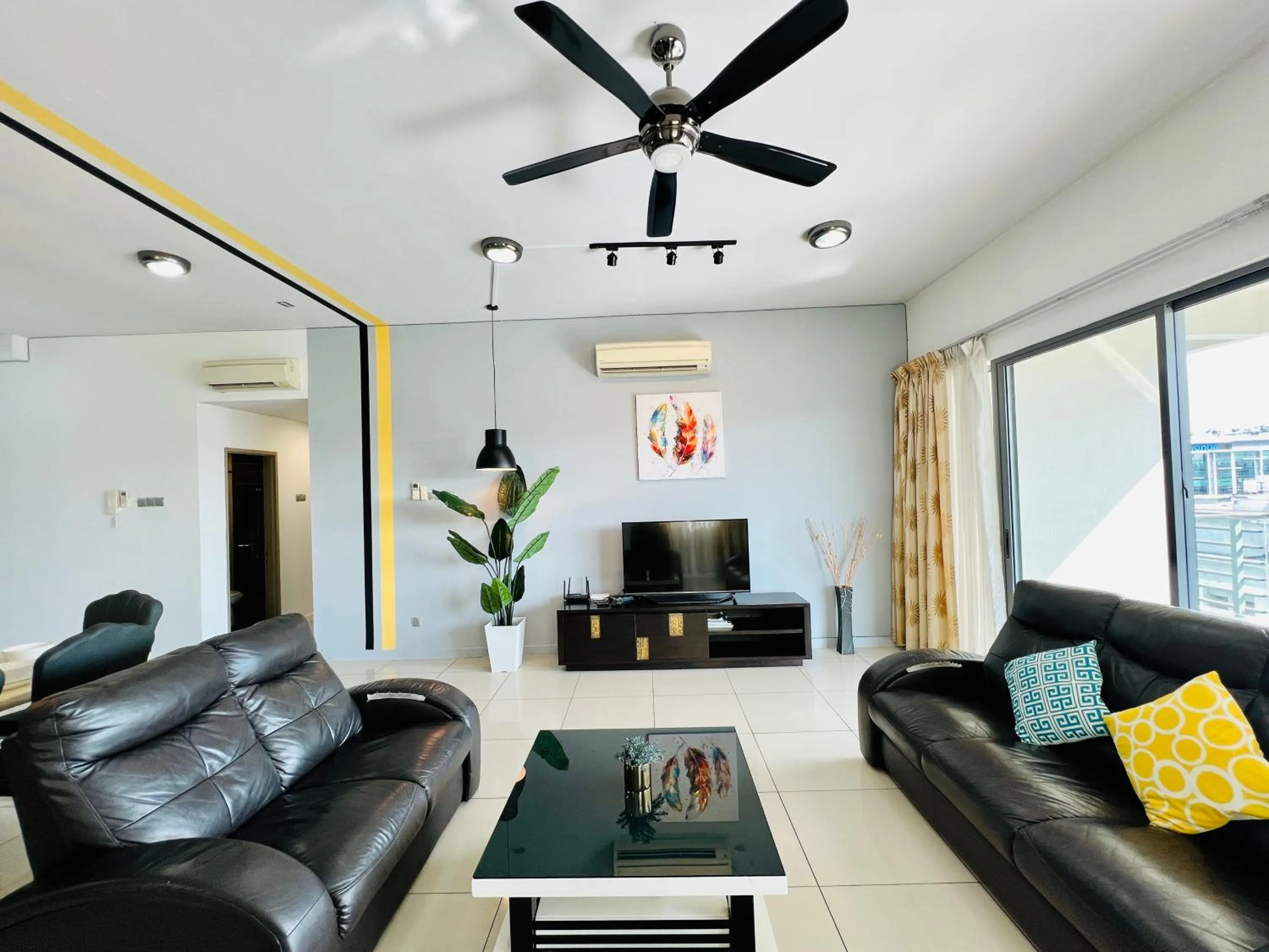 Communal lounge/ TV room in AJ Suites @ Loft Imago KK