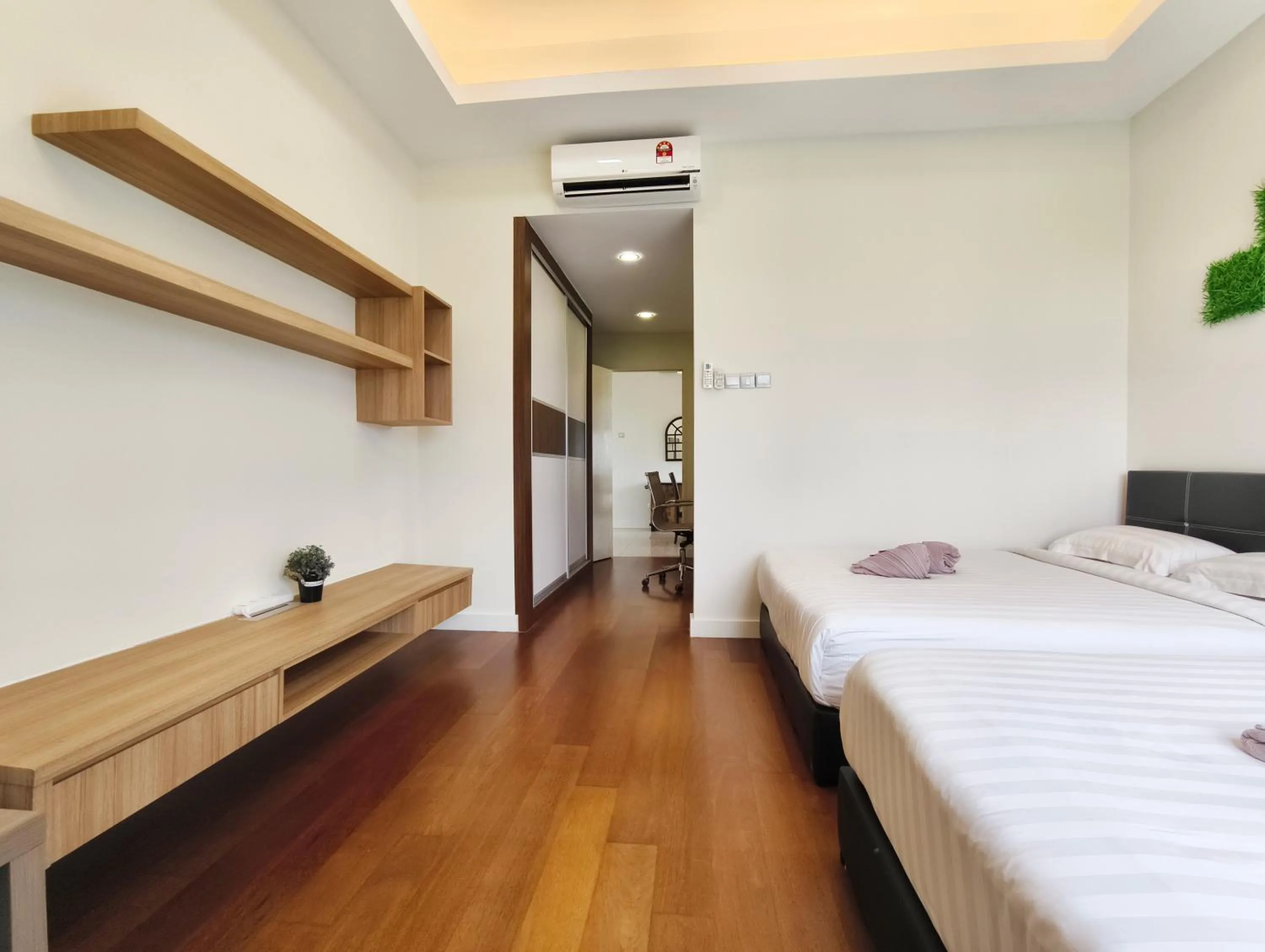 Bed in AJ Suites @ Loft Imago KK