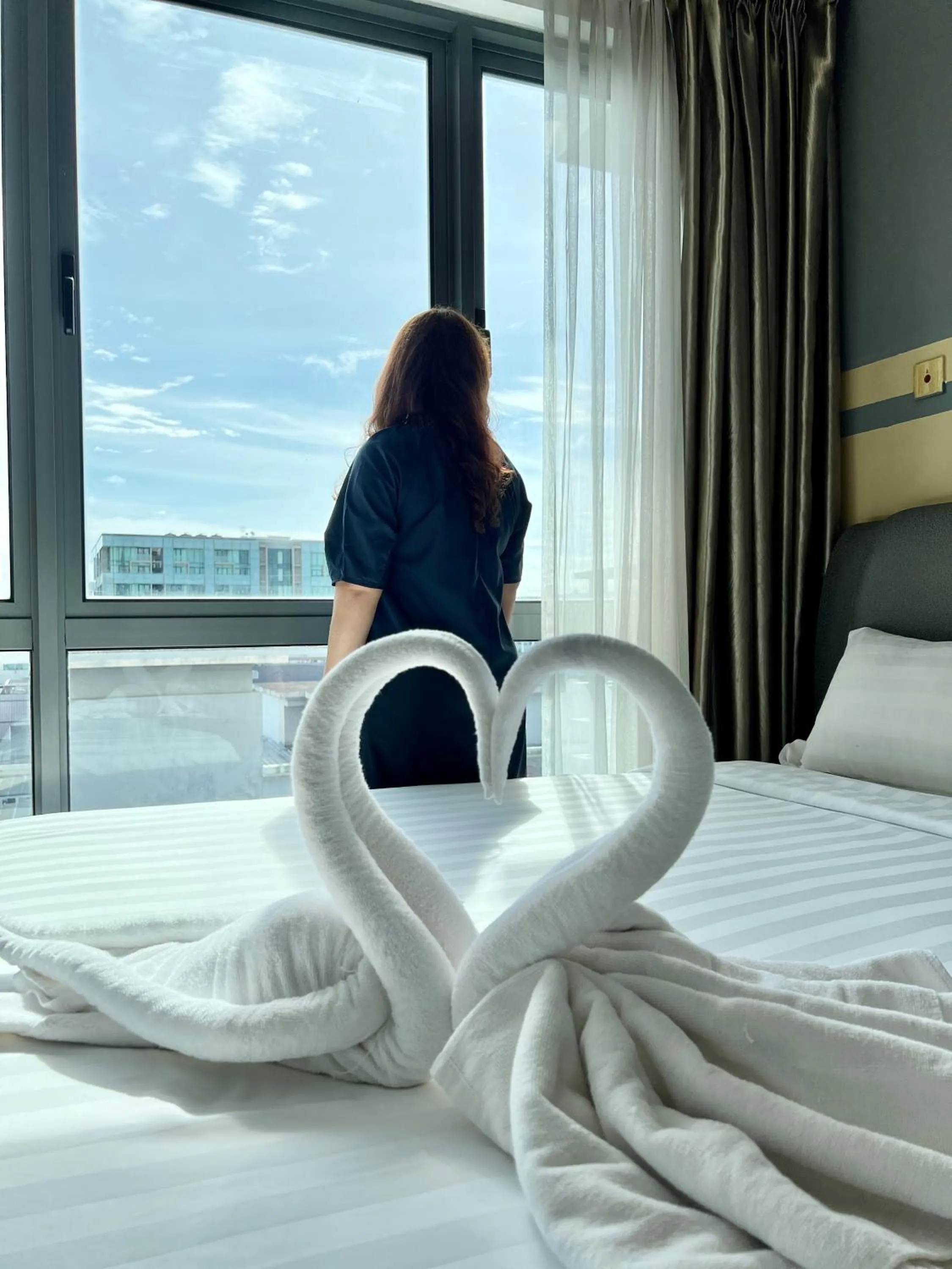 Decorative detail, Bed in AJ Suites @ Loft Imago KK