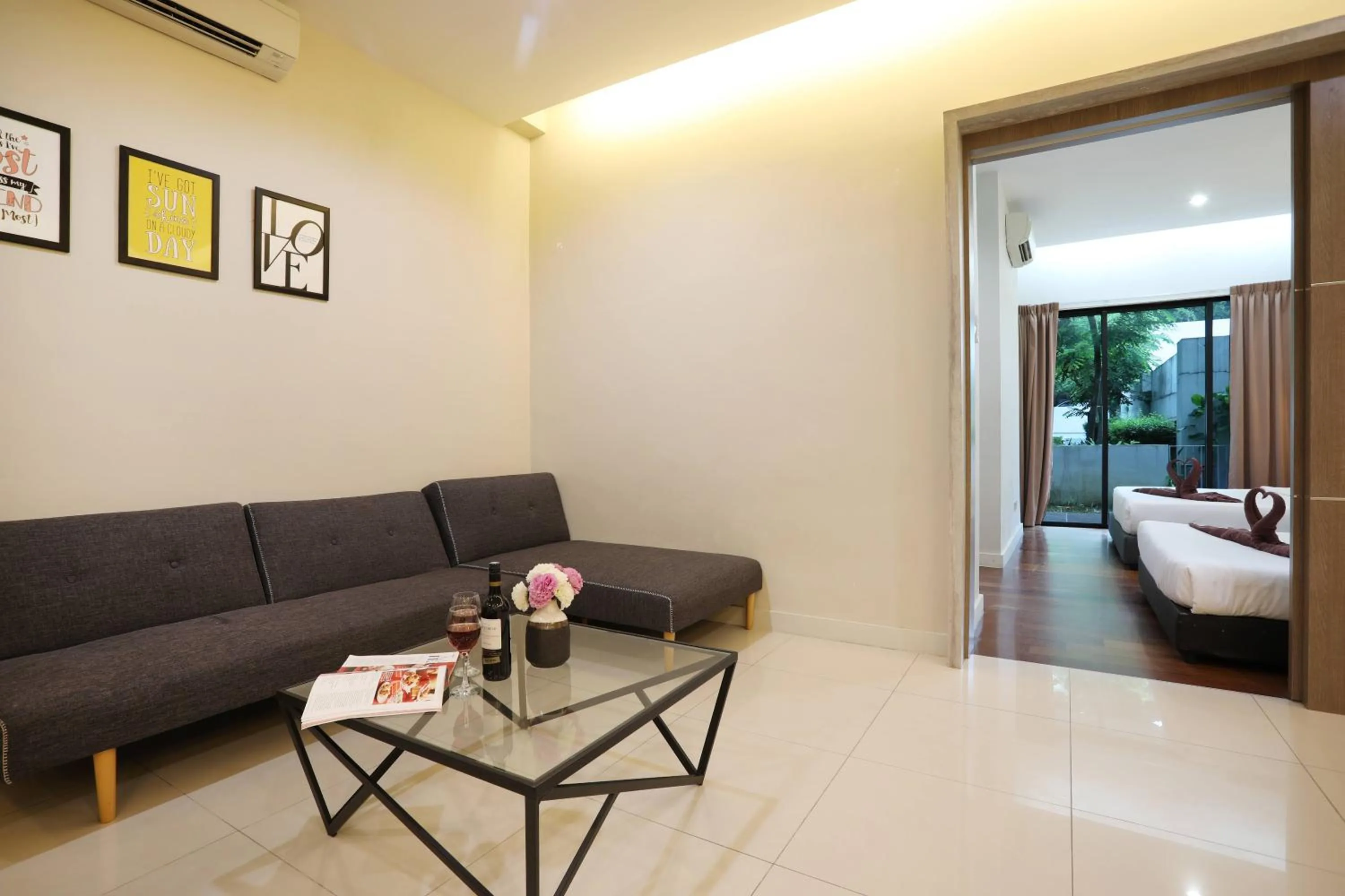 Seating area, Bed in AJ Suites @ Loft Imago KK