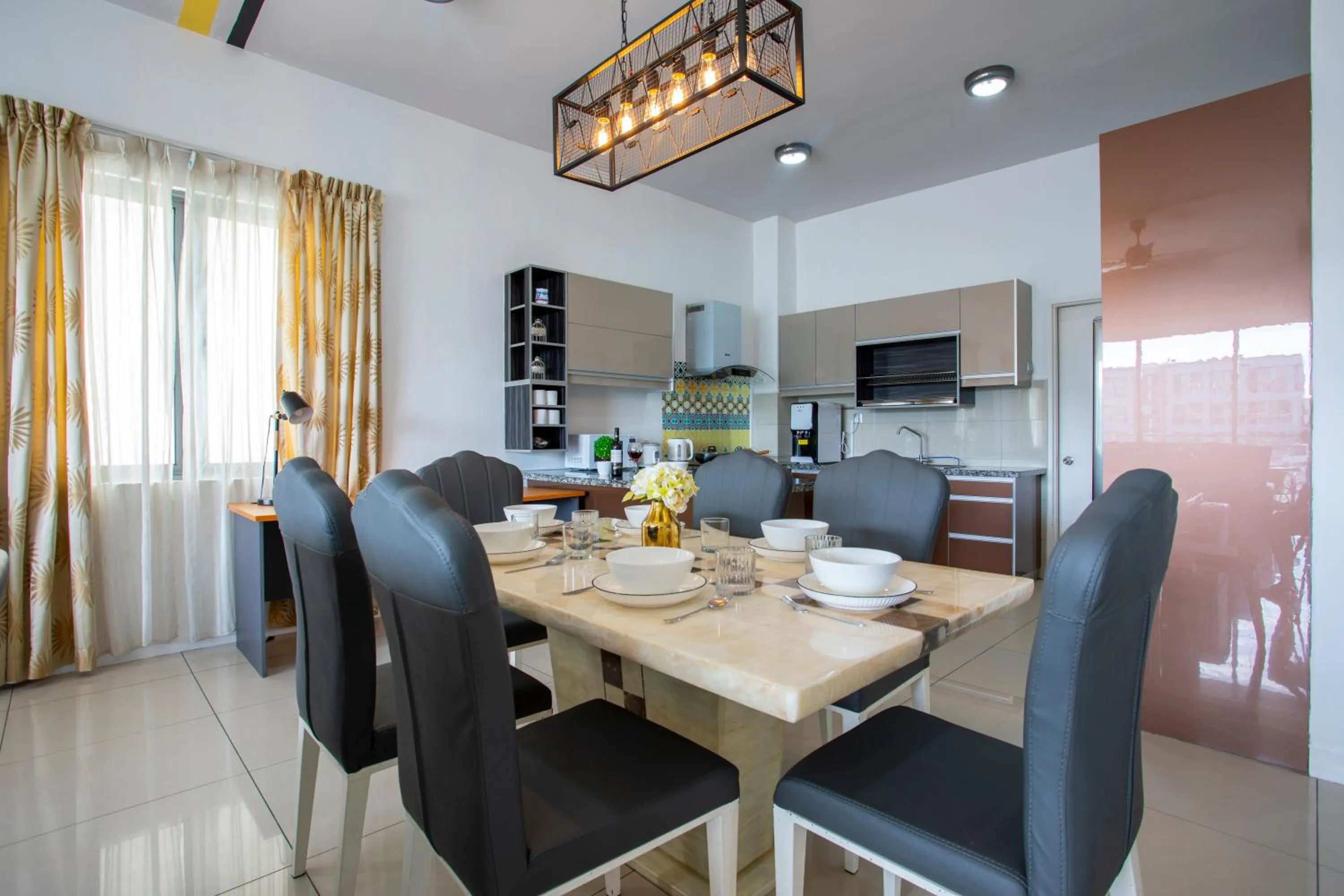 Dining area in AJ Suites @ Loft Imago KK