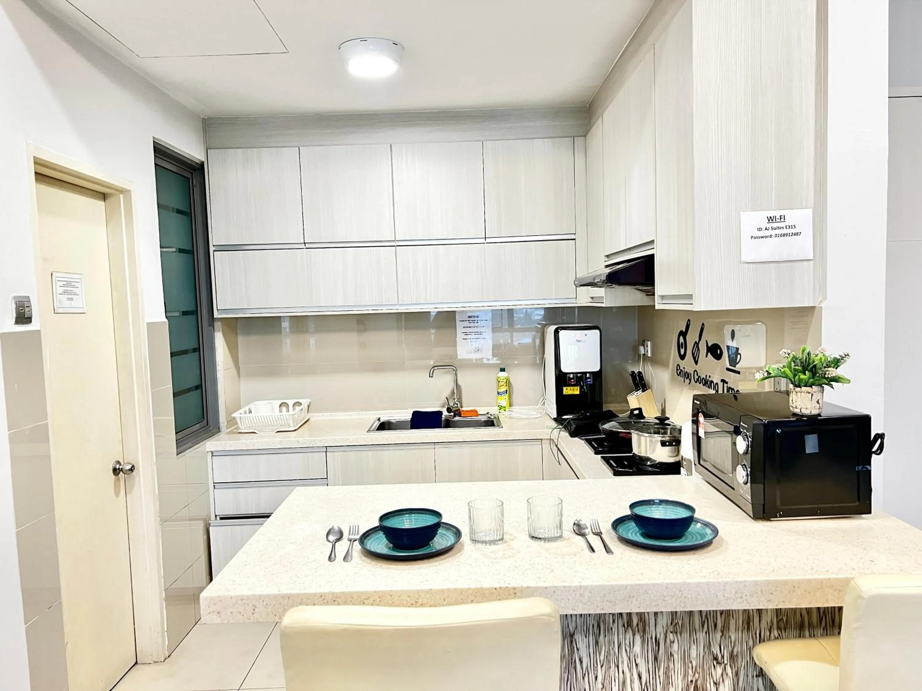 Kitchen or kitchenette in AJ Suites @ Loft Imago KK