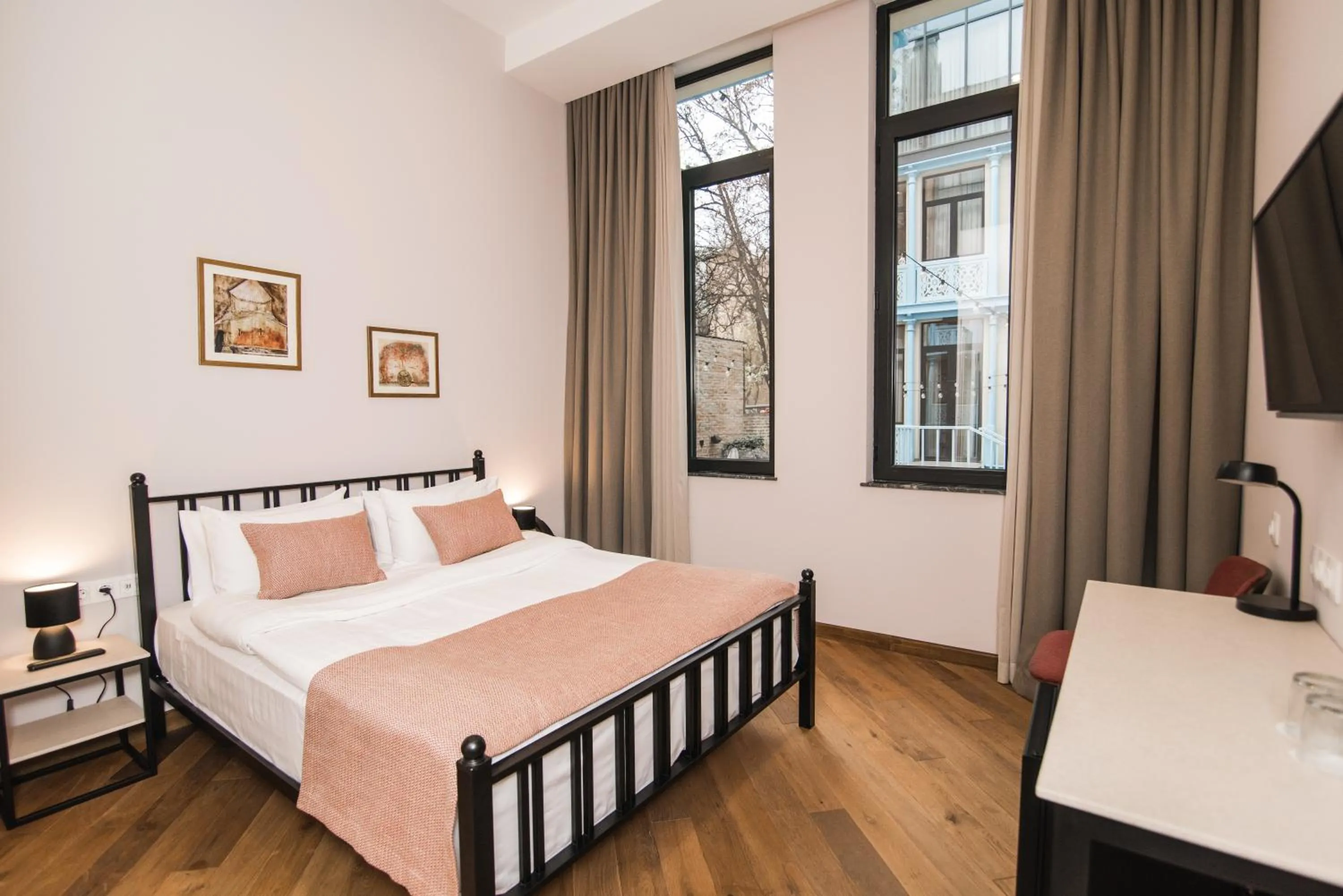 Photo of the whole room, Bed in Makmani Boutique Hotel by DNT Group