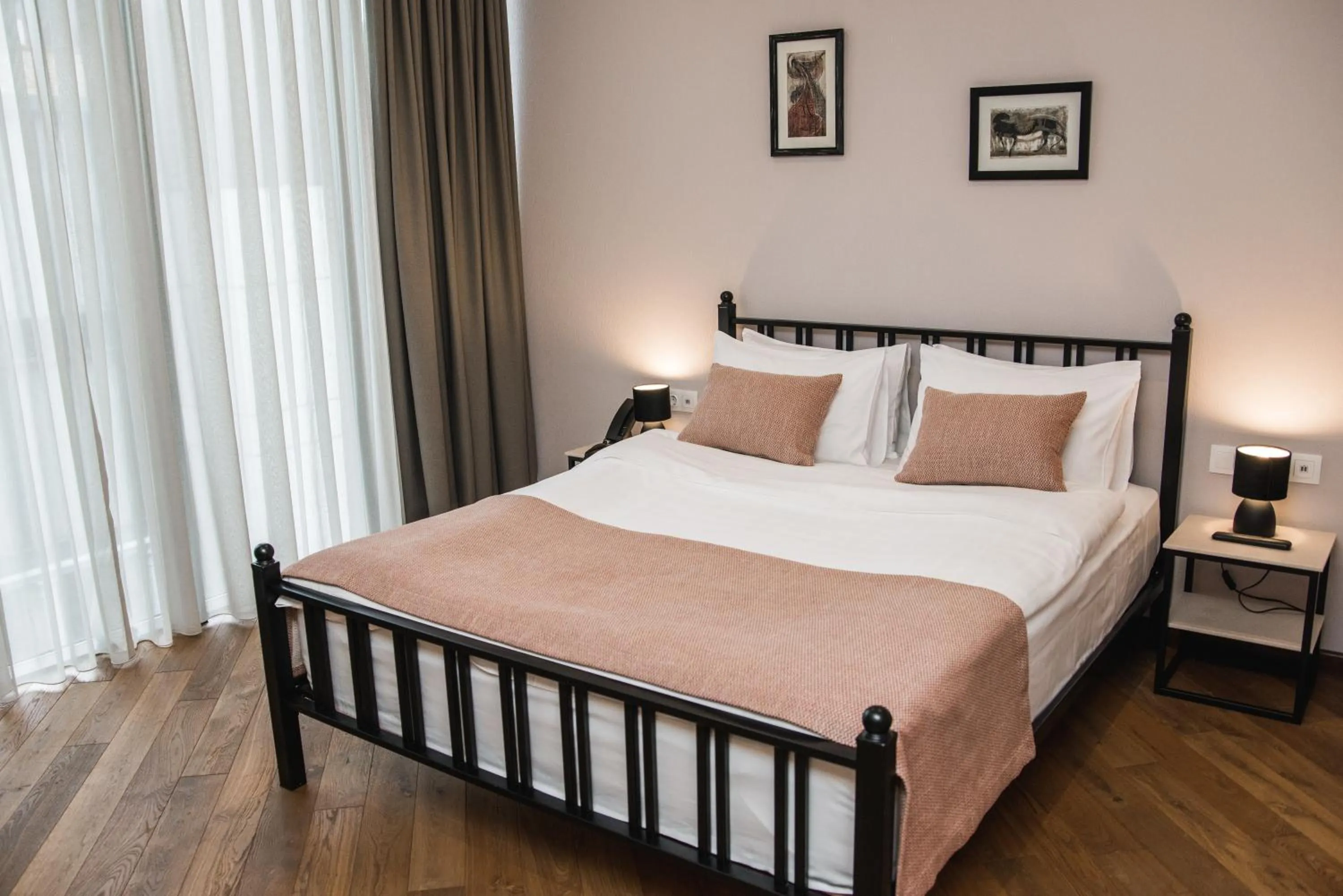 Photo of the whole room, Bed in Makmani Boutique Hotel by DNT Group