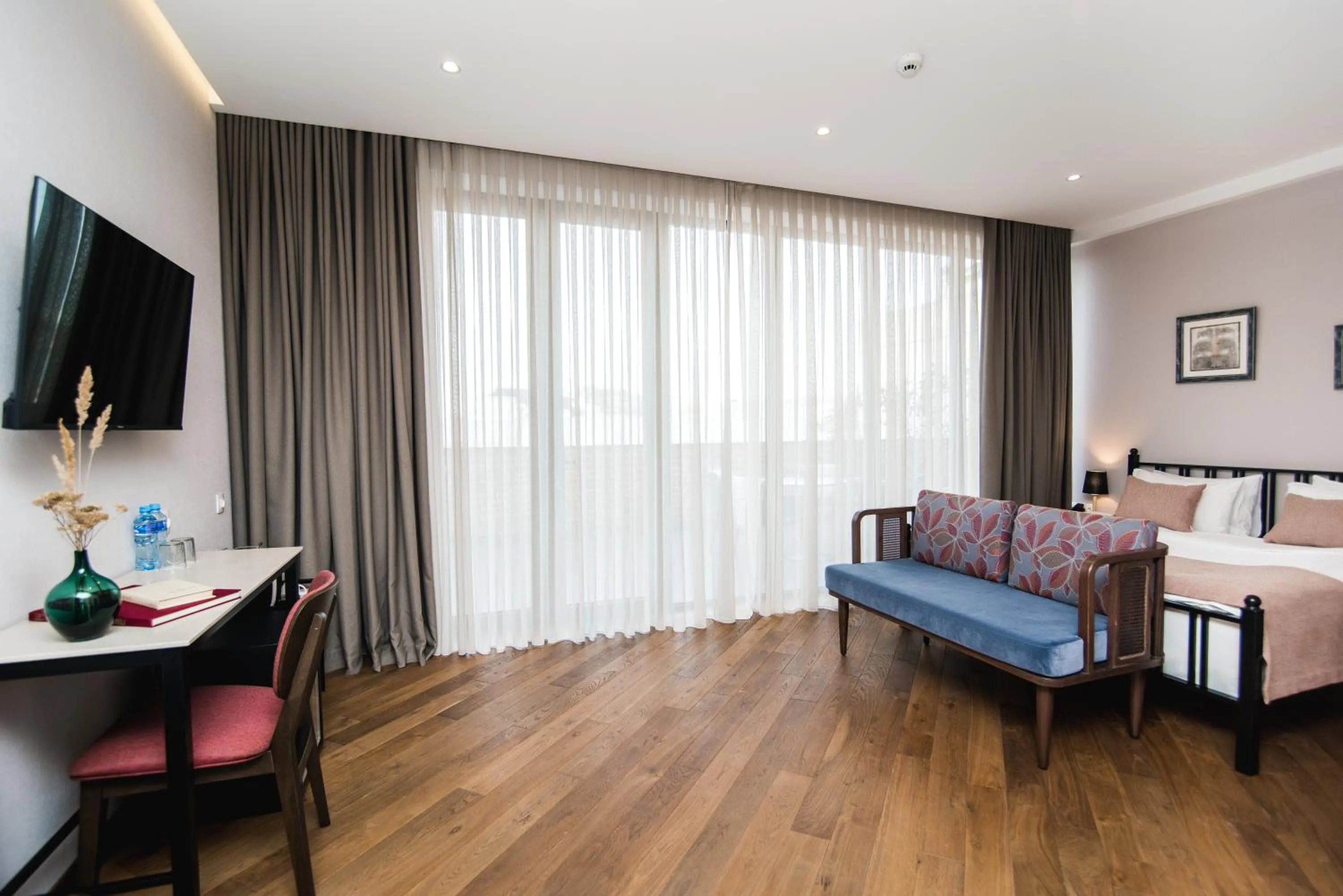 Photo of the whole room, Bed in Makmani Boutique Hotel by DNT Group