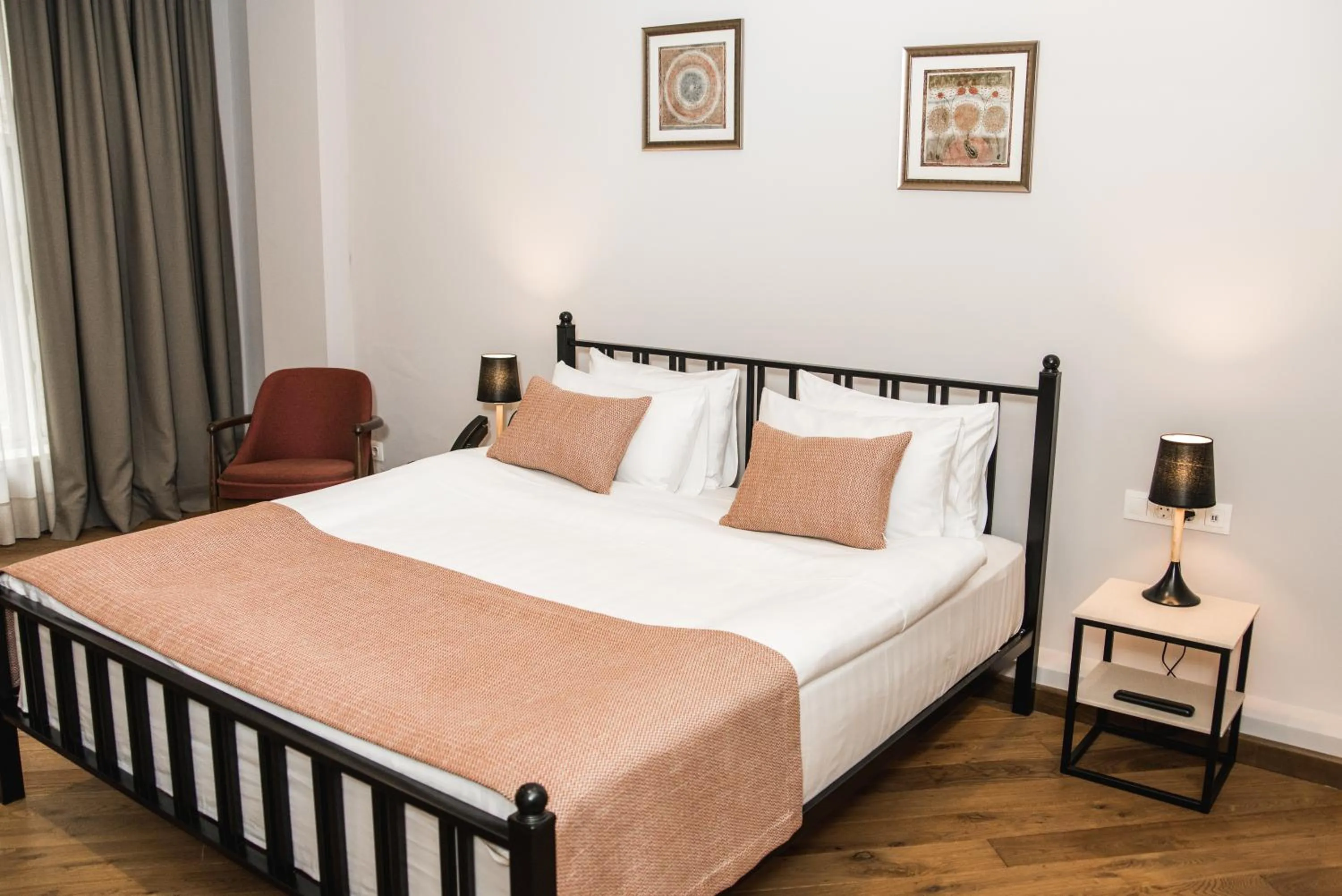 Photo of the whole room, Bed in Makmani Boutique Hotel by DNT Group