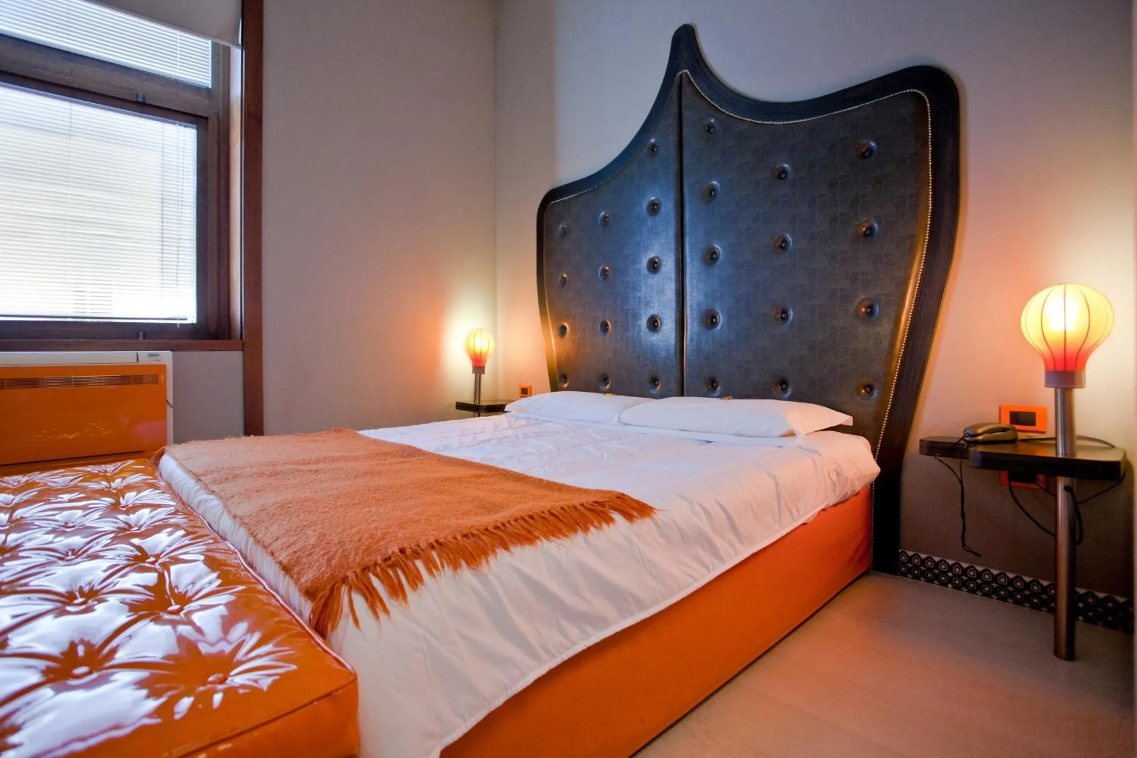 Bed in Orange Hotel