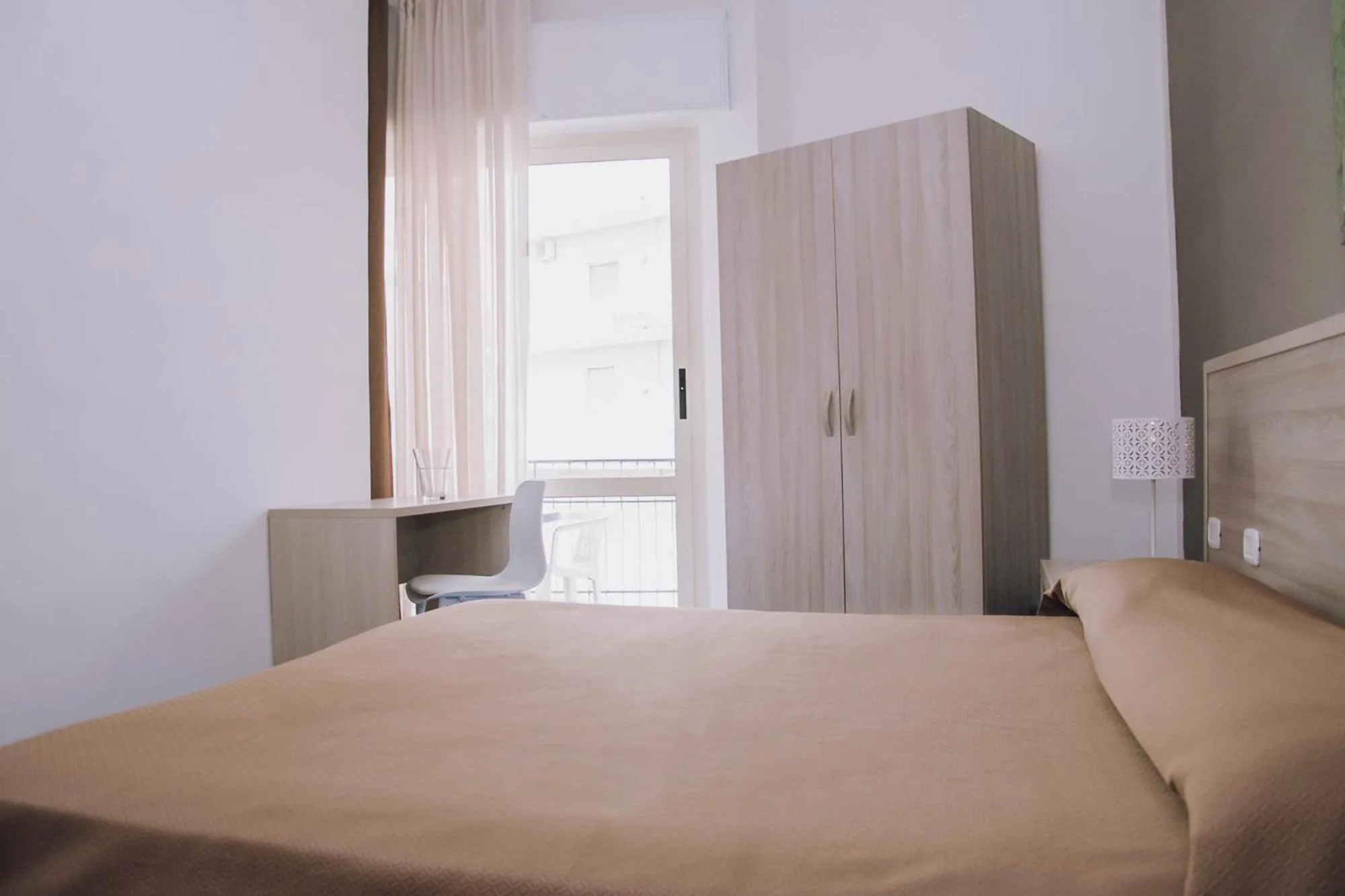 Bed in Hotel Piccolo Sogno