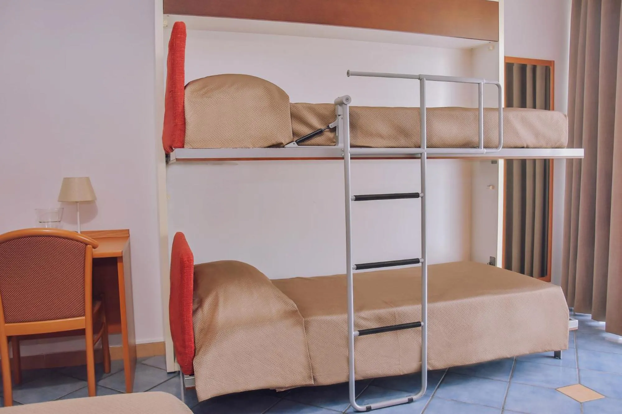 Bed in Hotel Piccolo Sogno