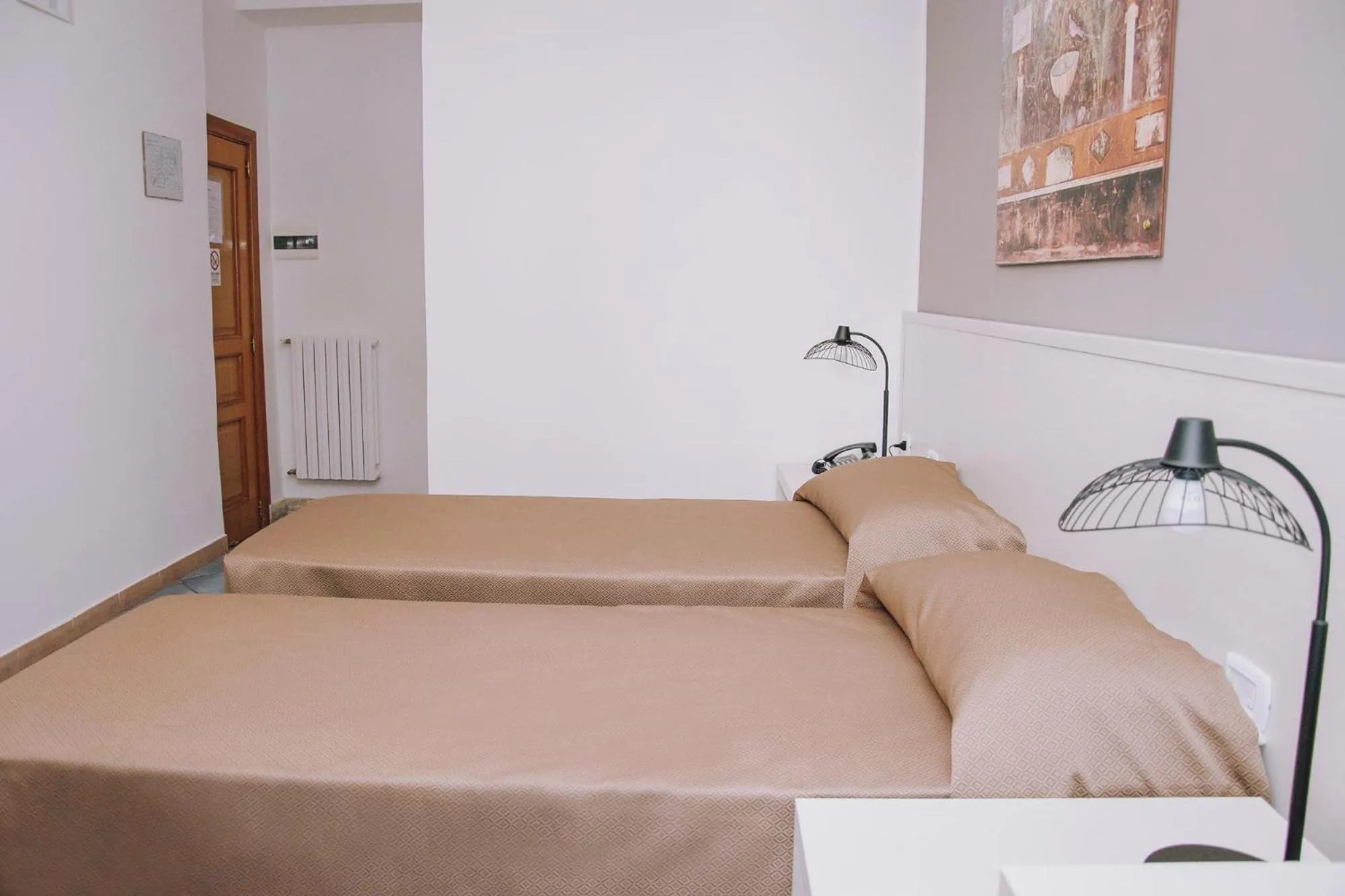 Bed in Hotel Piccolo Sogno