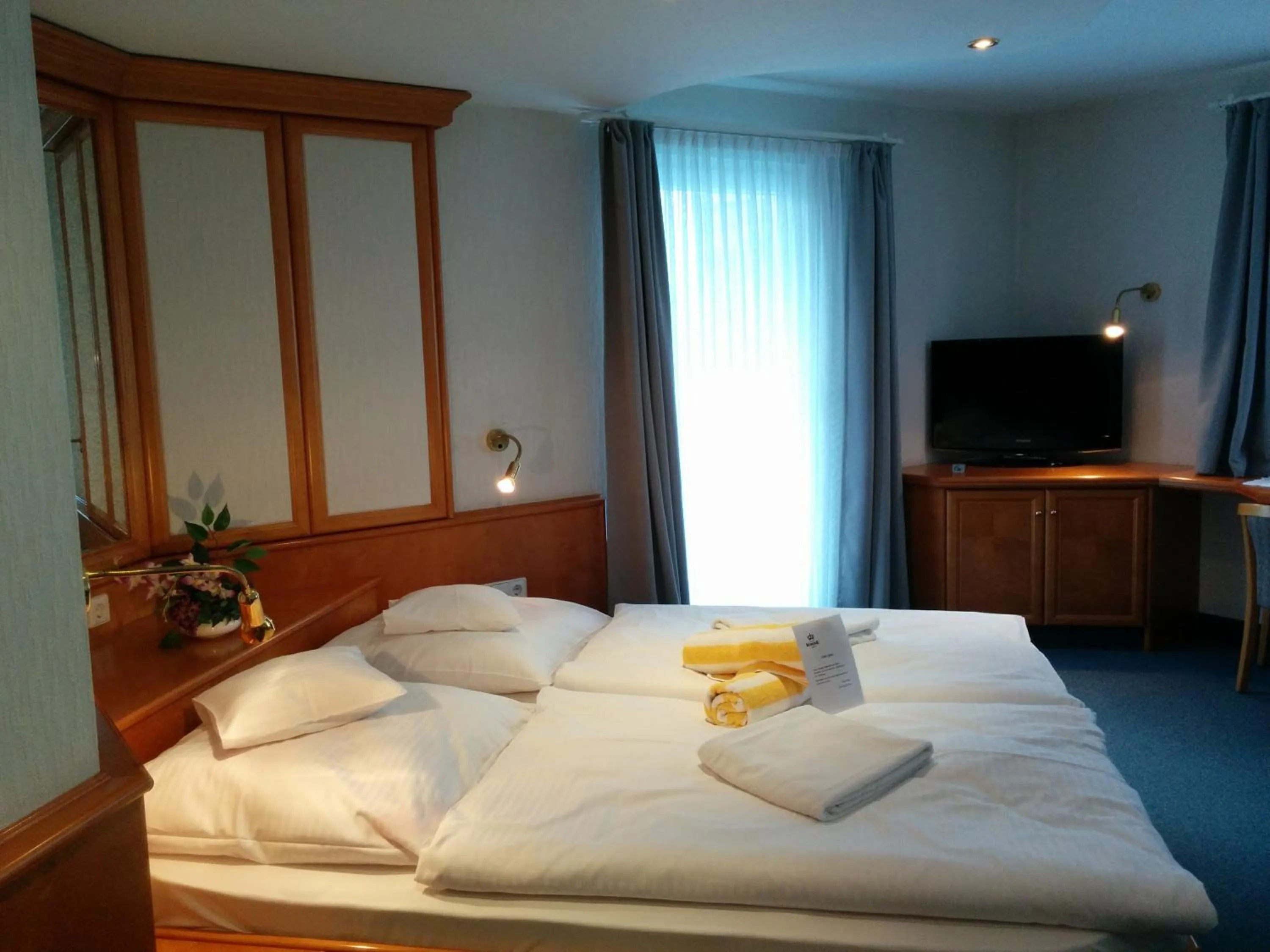 Photo of the whole room, Bed in Wellness Hotel Garni Krone