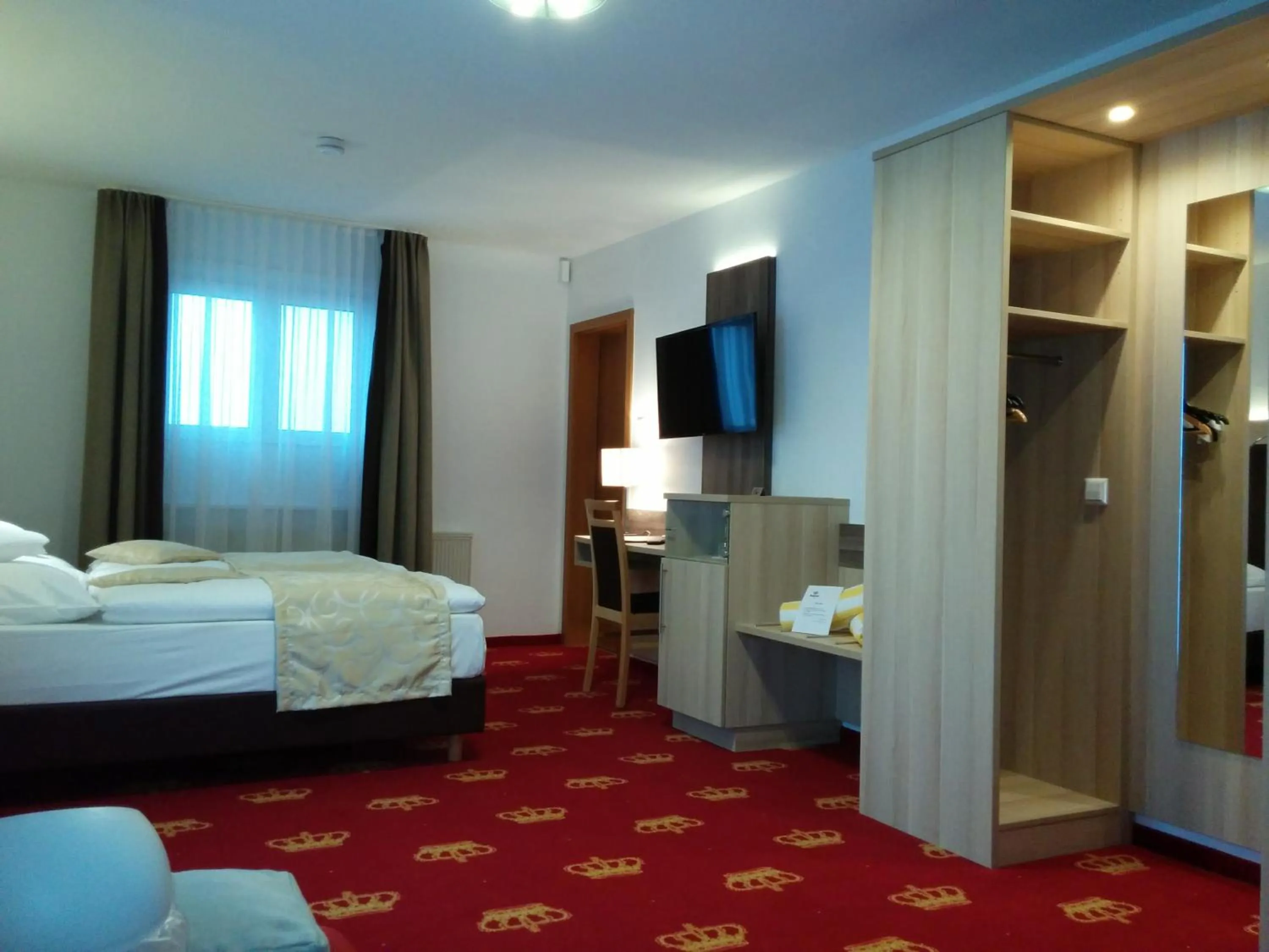 Photo of the whole room, Bed in Wellness Hotel Garni Krone