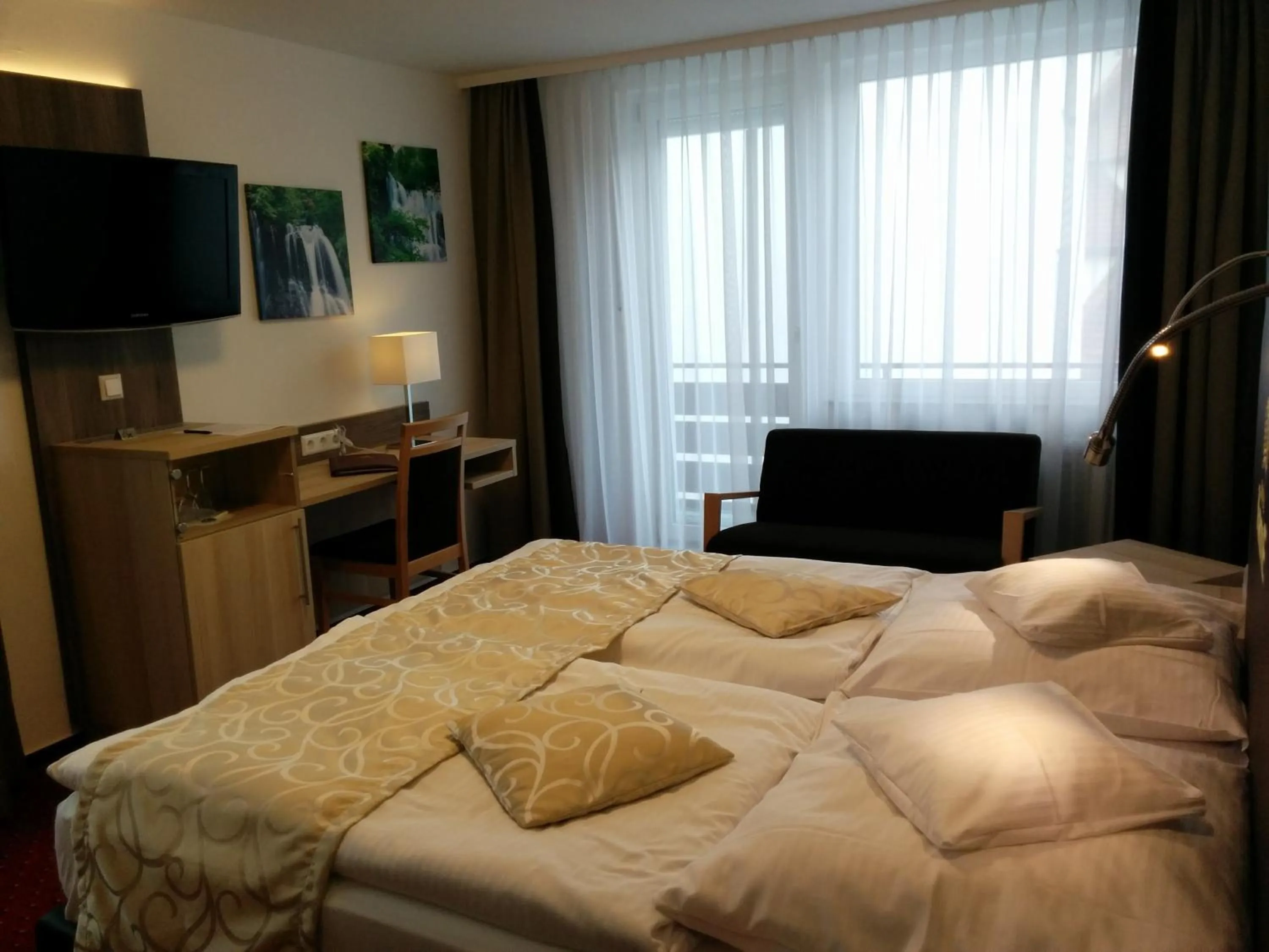 Photo of the whole room, Bed in Wellness Hotel Garni Krone