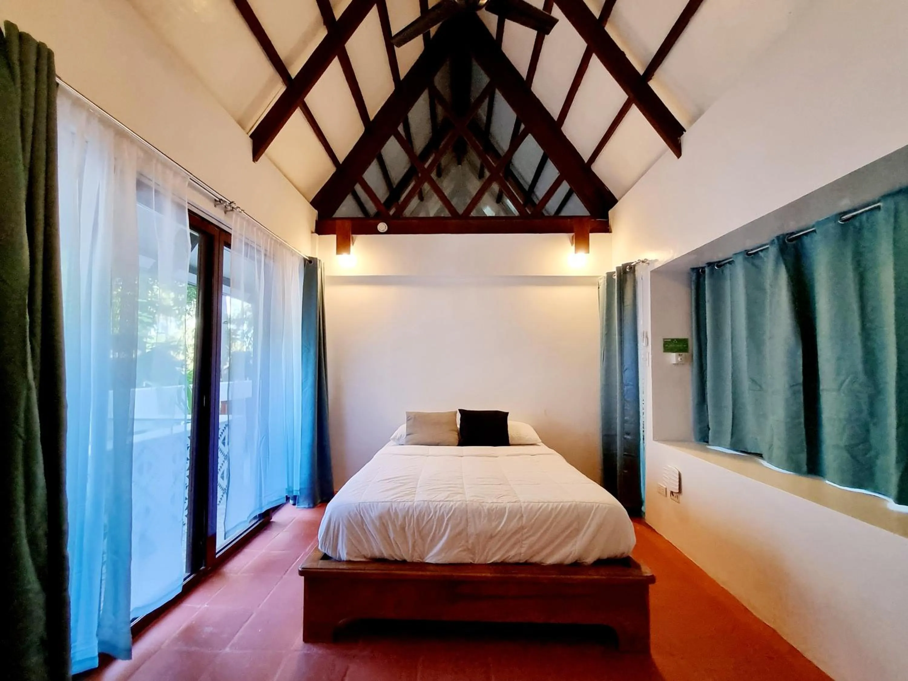 Bed in Casalay Boutique Villas & Dive