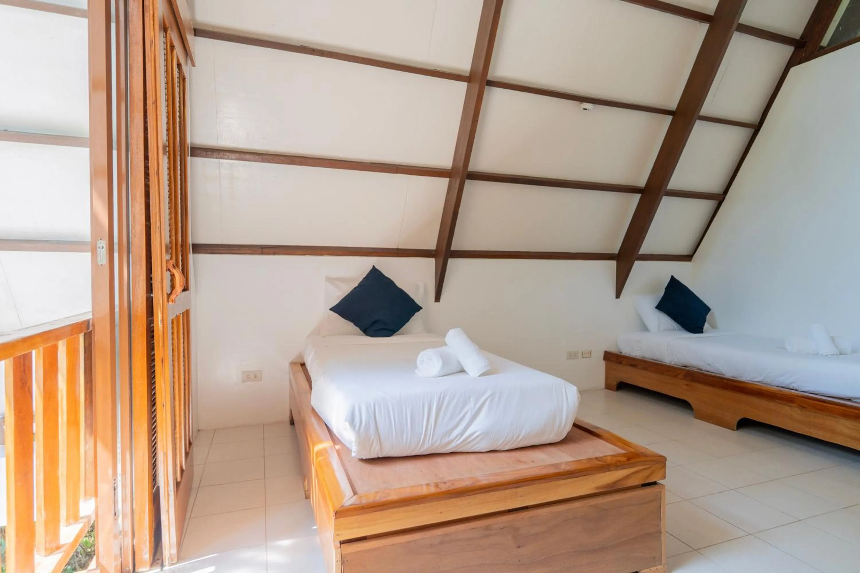 Bed in Casalay Boutique Villas & Dive