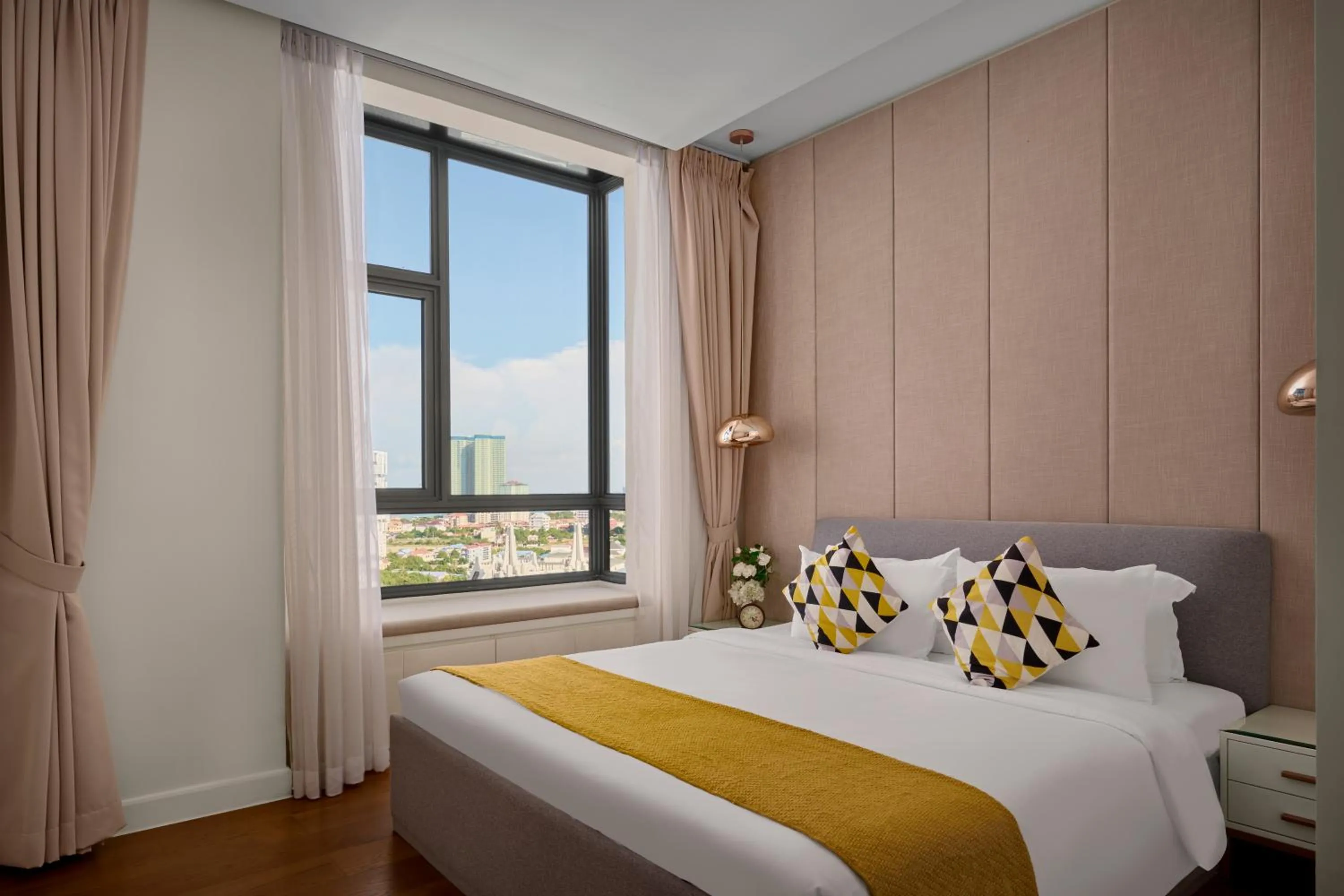 Bed in The Peninsula Phnom Penh