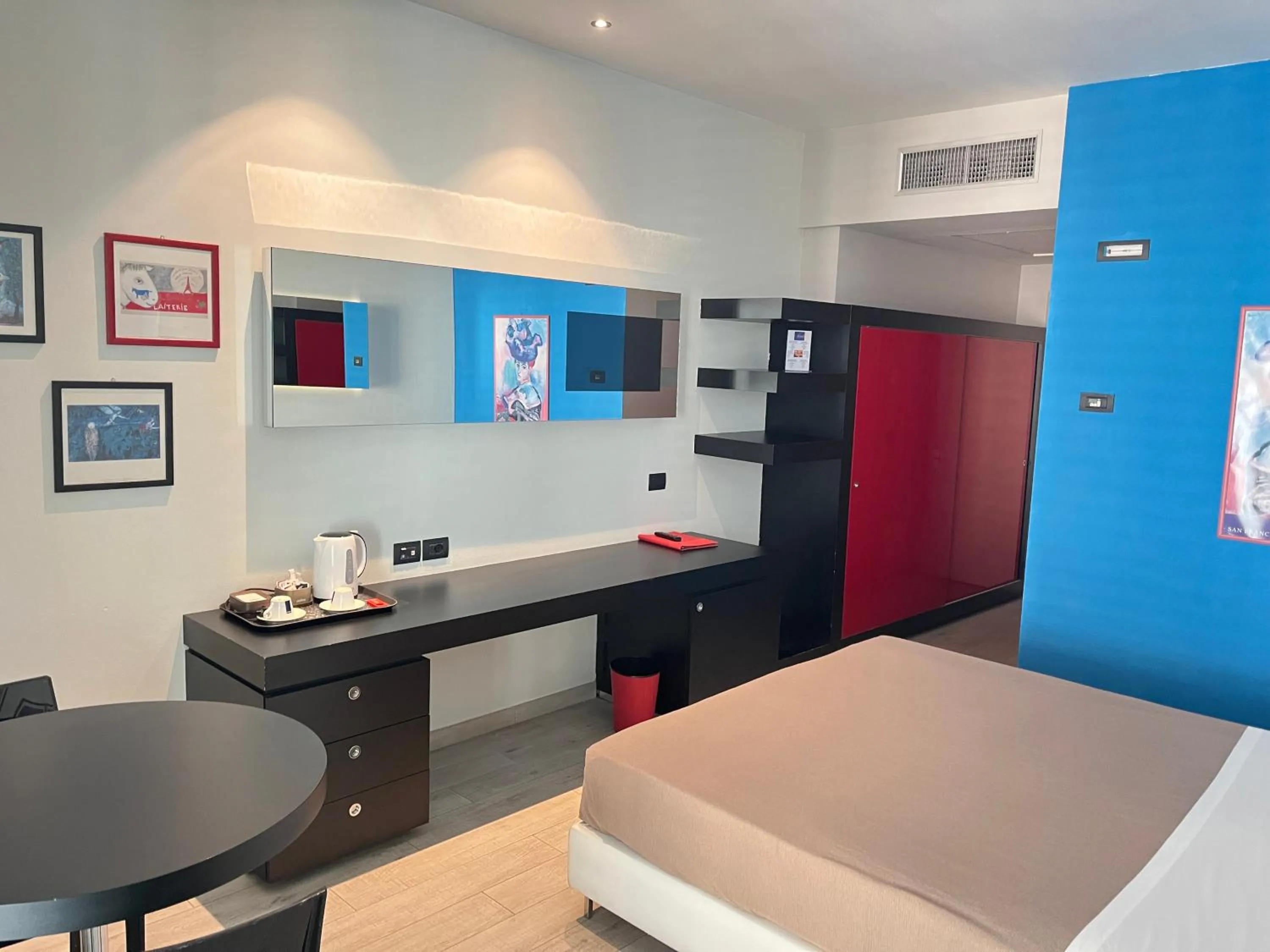 Bedroom in Blue Shades Hotel