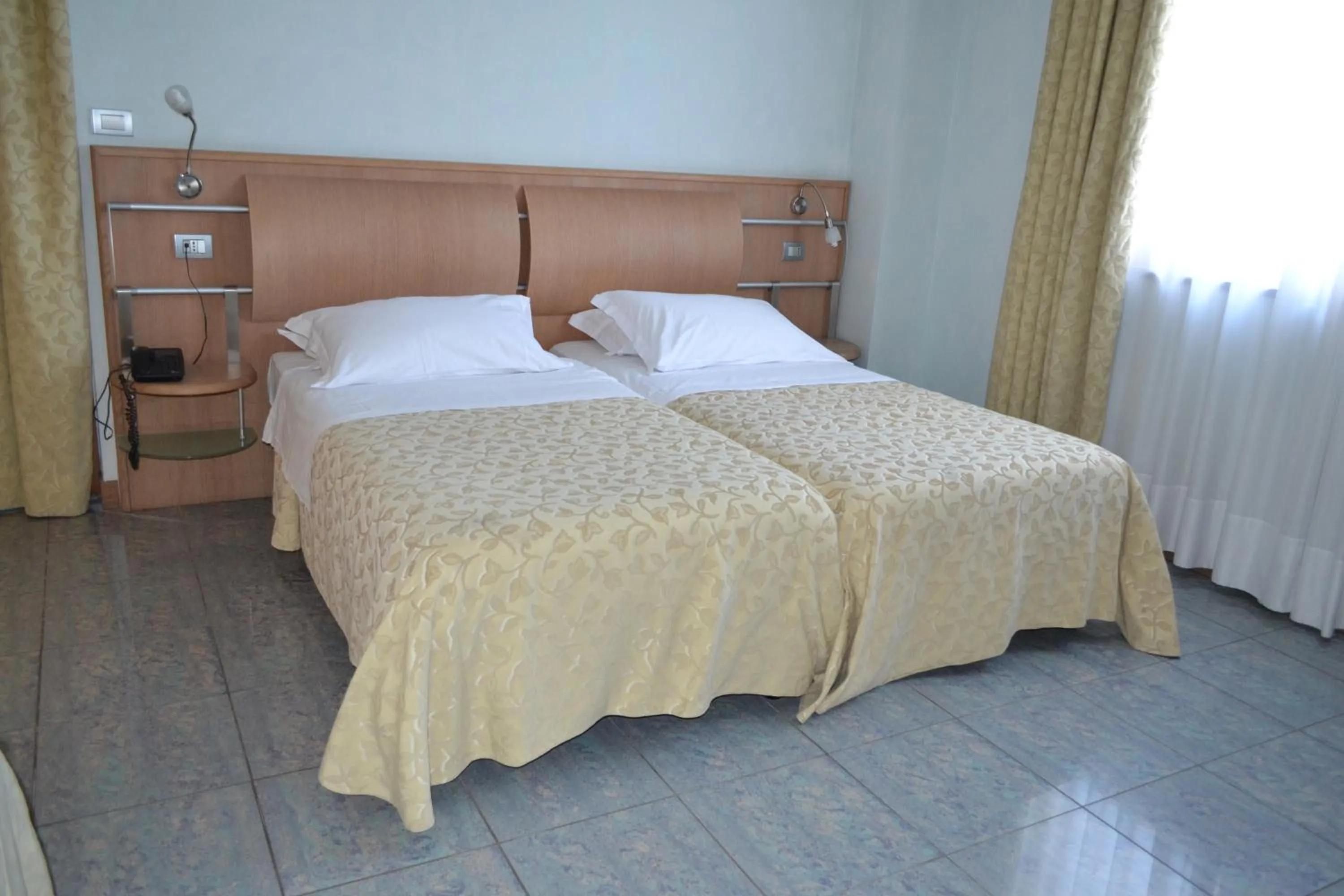 Bed in Marina Palace Hotel & Congress Hall