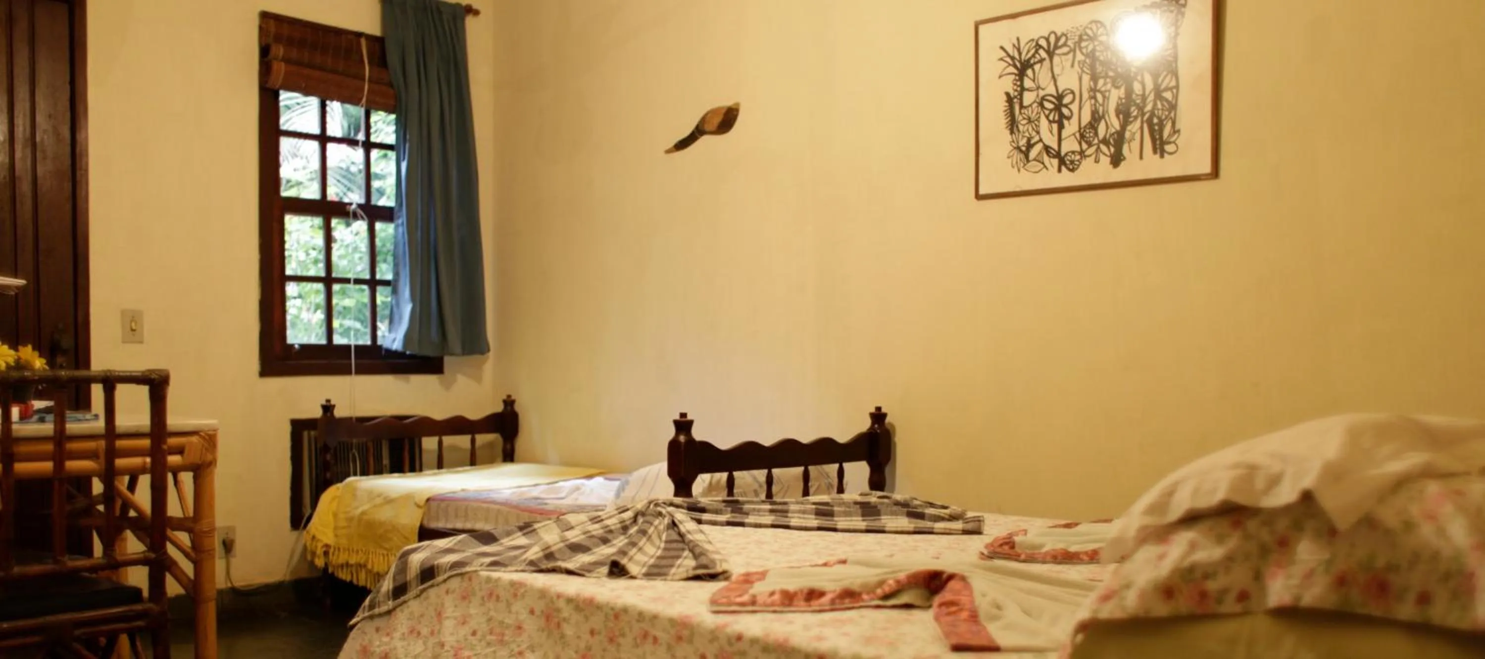 Bed in Pousada Alicia