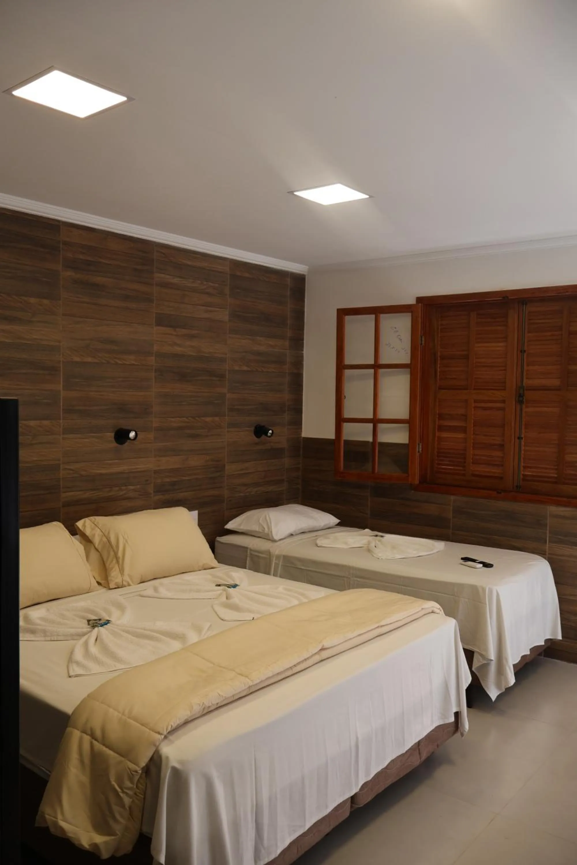 Bed in Pousada Alicia