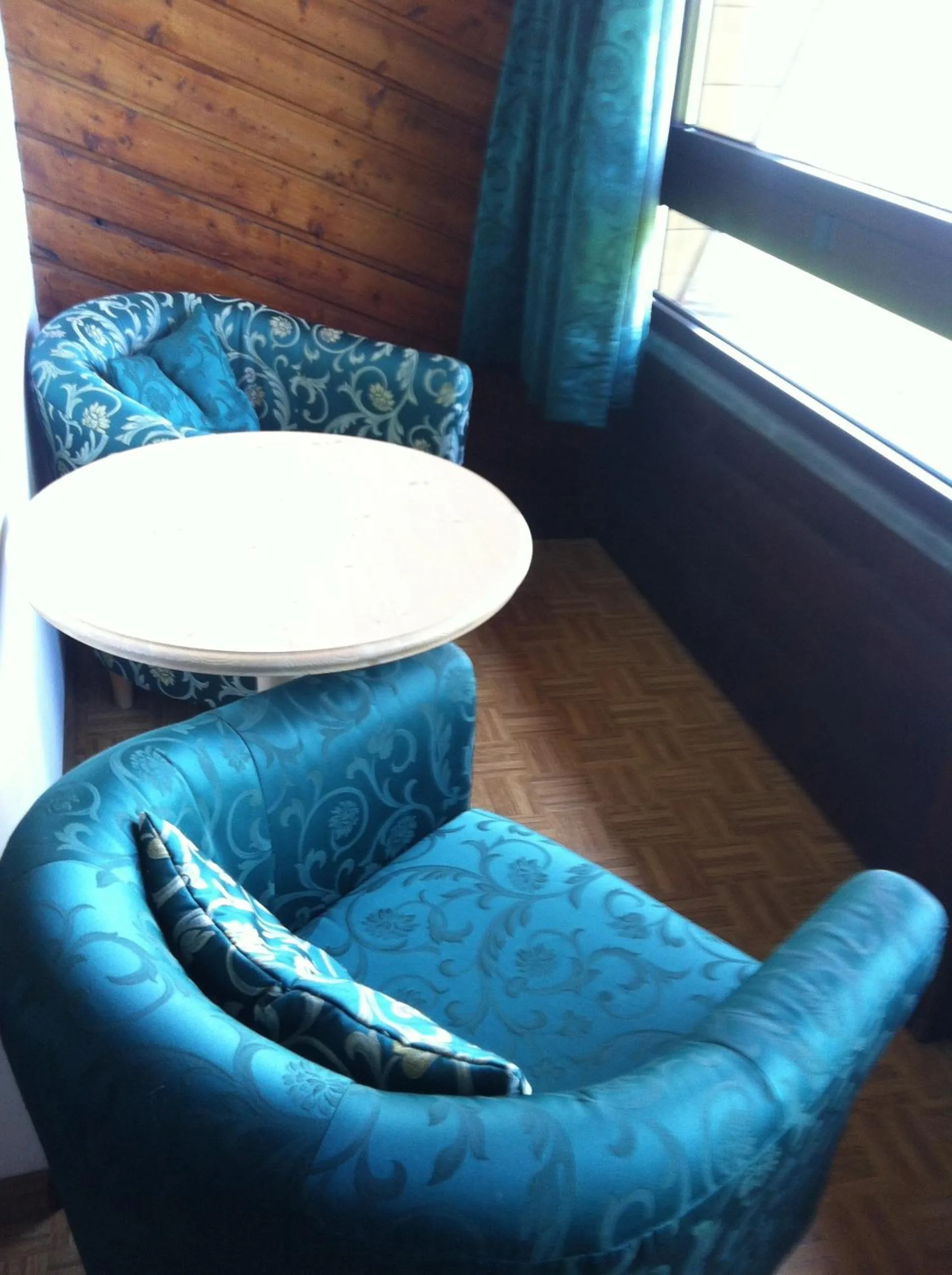 Seating area in Piccolo Hotel Sciliar