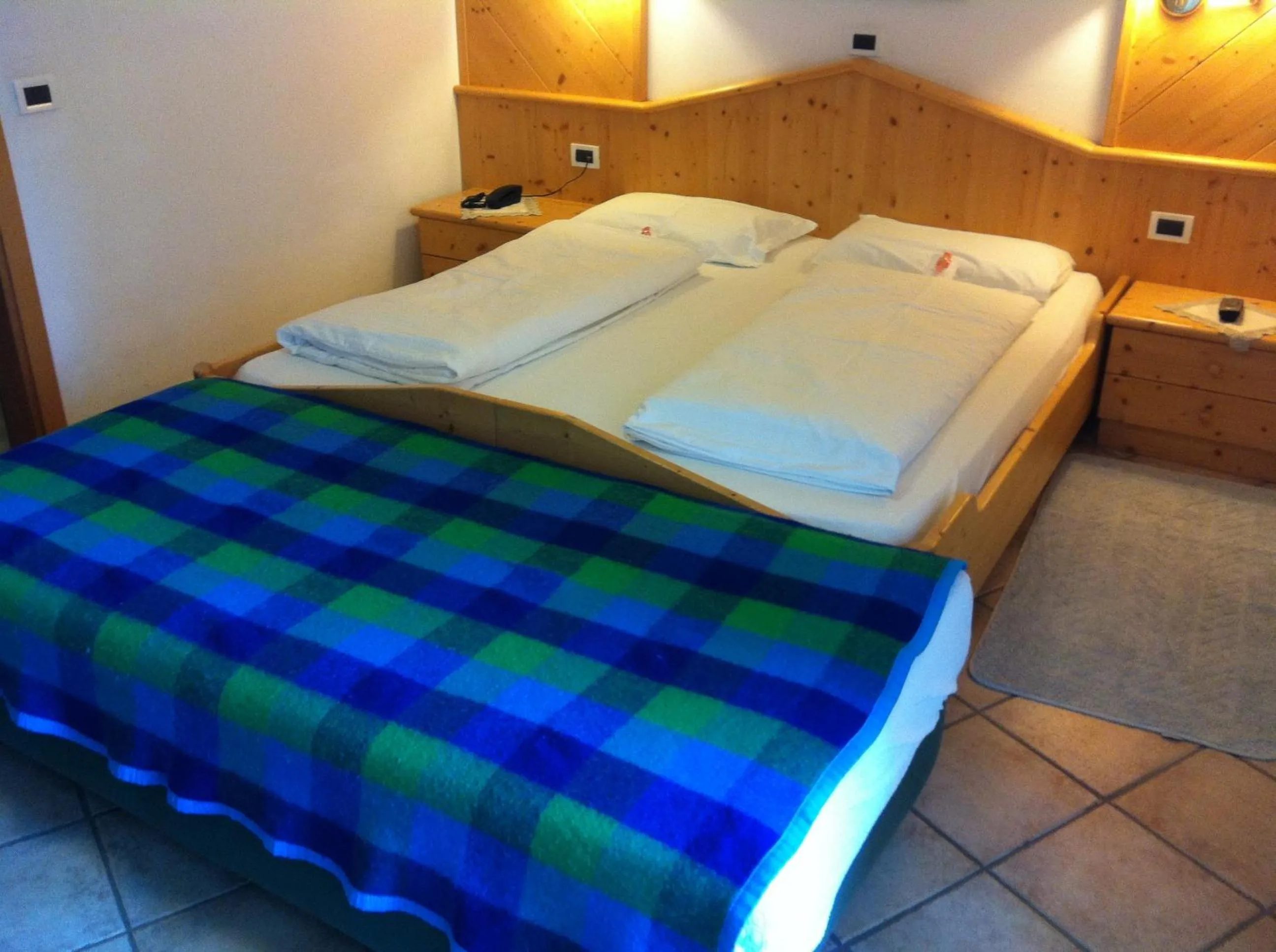 Bed in Piccolo Hotel Sciliar