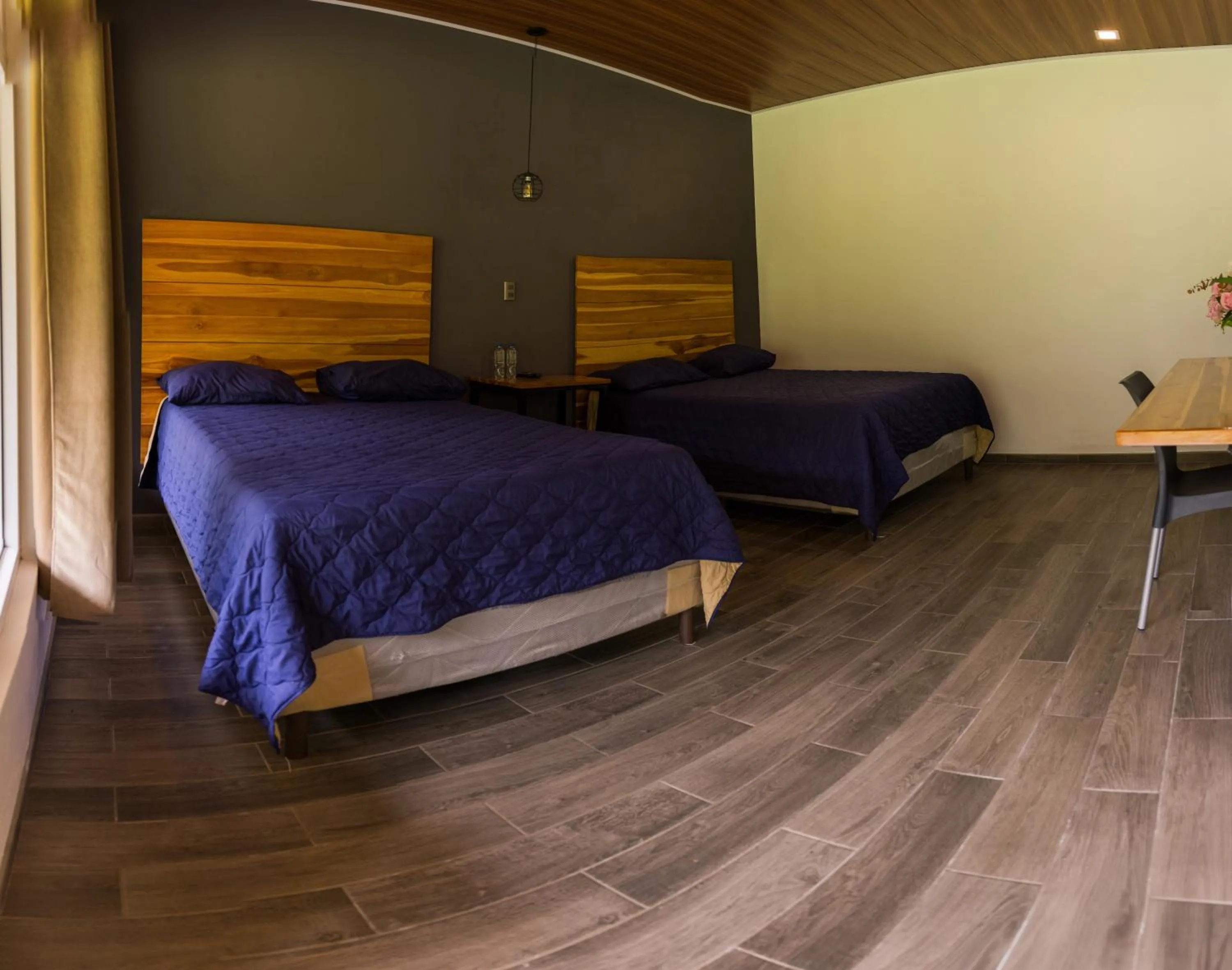 Bed in Casa Montana Hotel