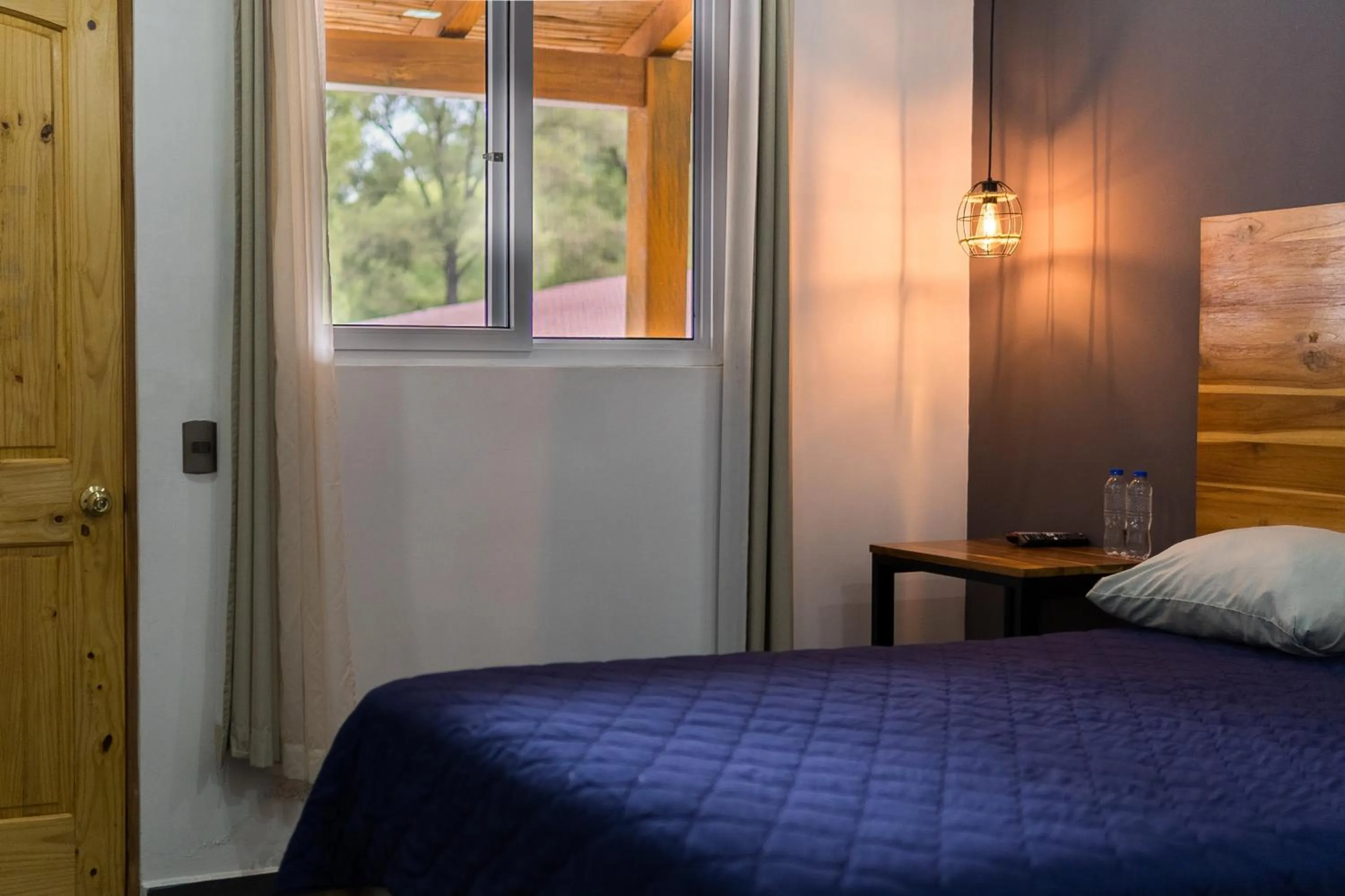 Bed in Casa Montana Hotel