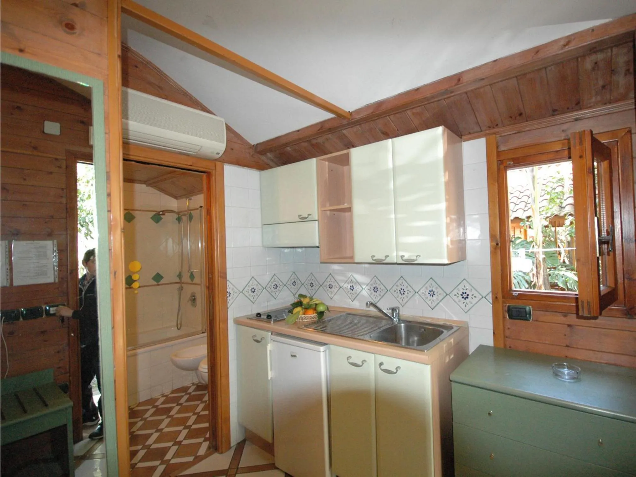 Kitchen or kitchenette in Residence Villaggio Verde