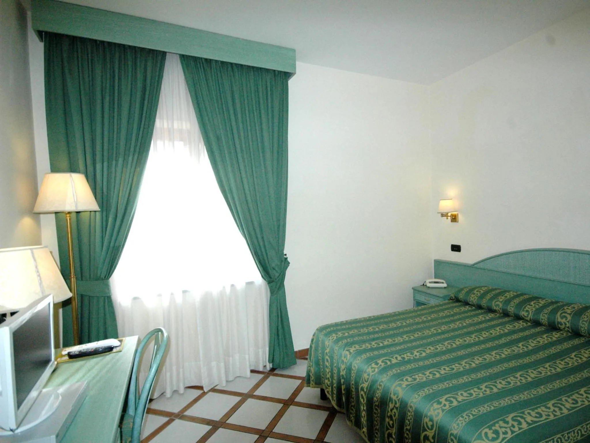 Decorative detail, Bed in Residence Villaggio Verde