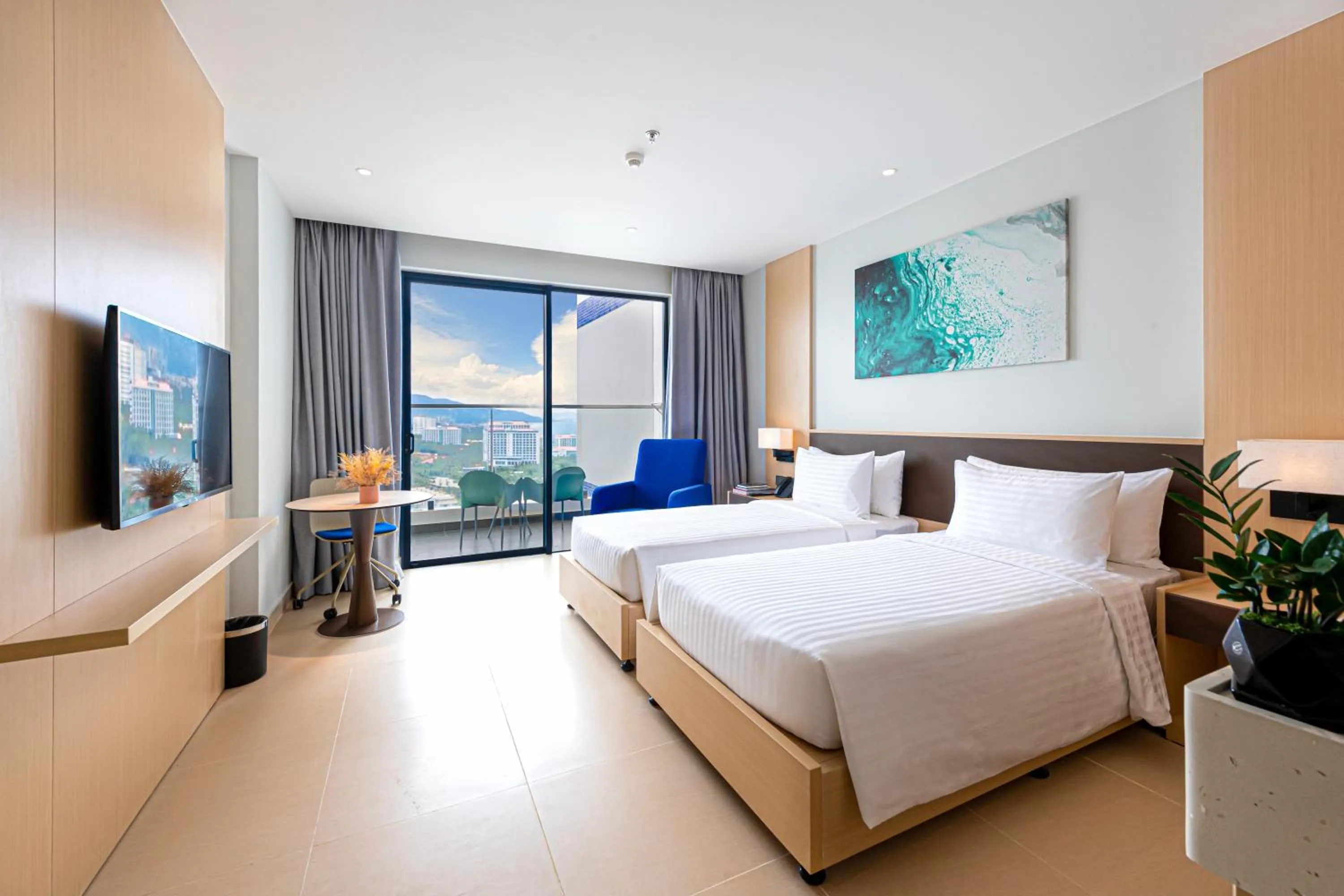 Bed in The Empyrean Cam Ranh Beach Resort