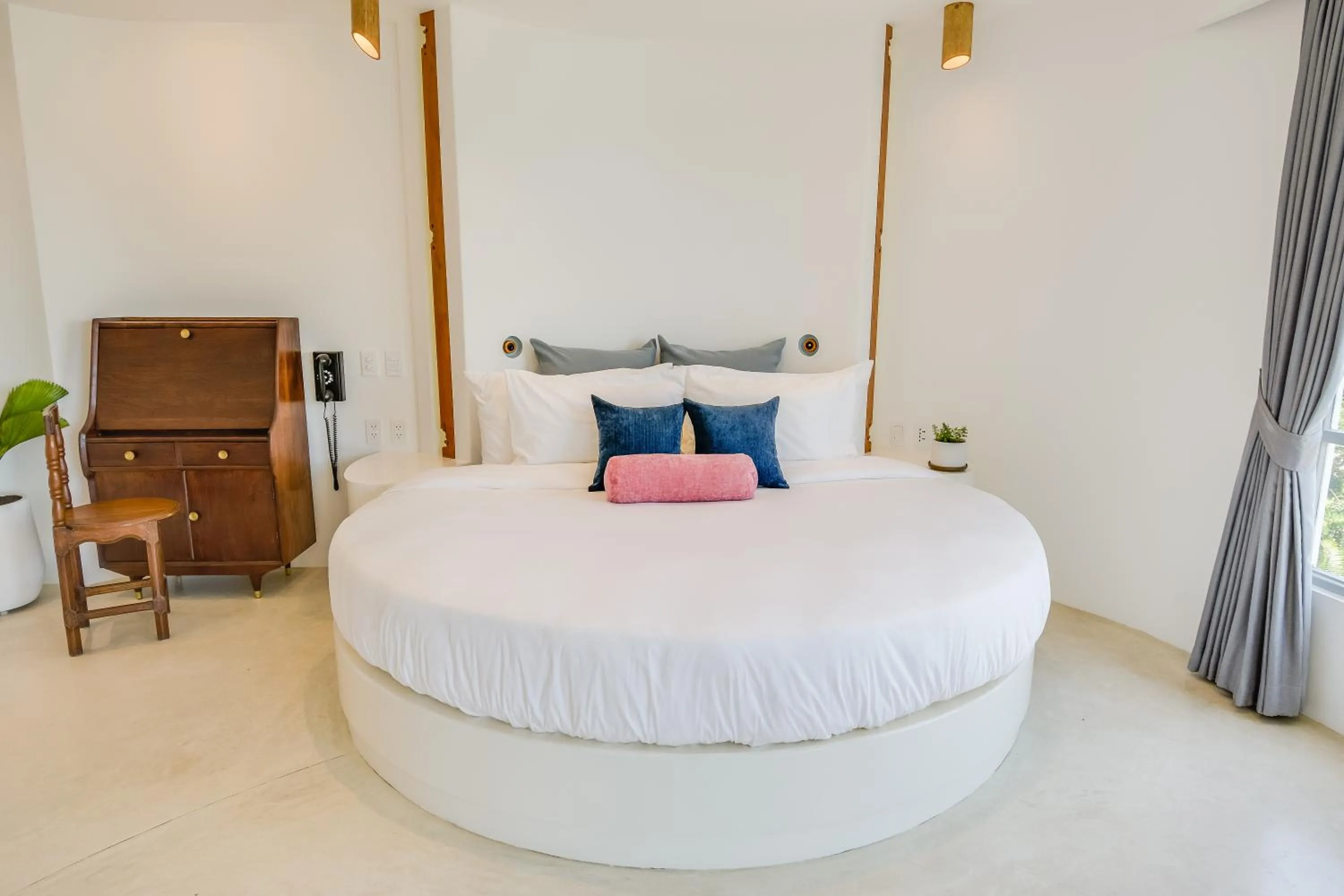 Bed in Ampersand Resort