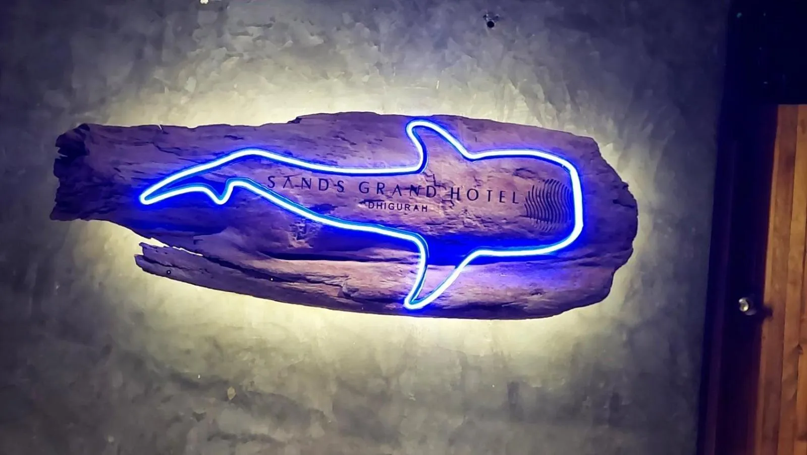 Property logo or sign in Sands Grand