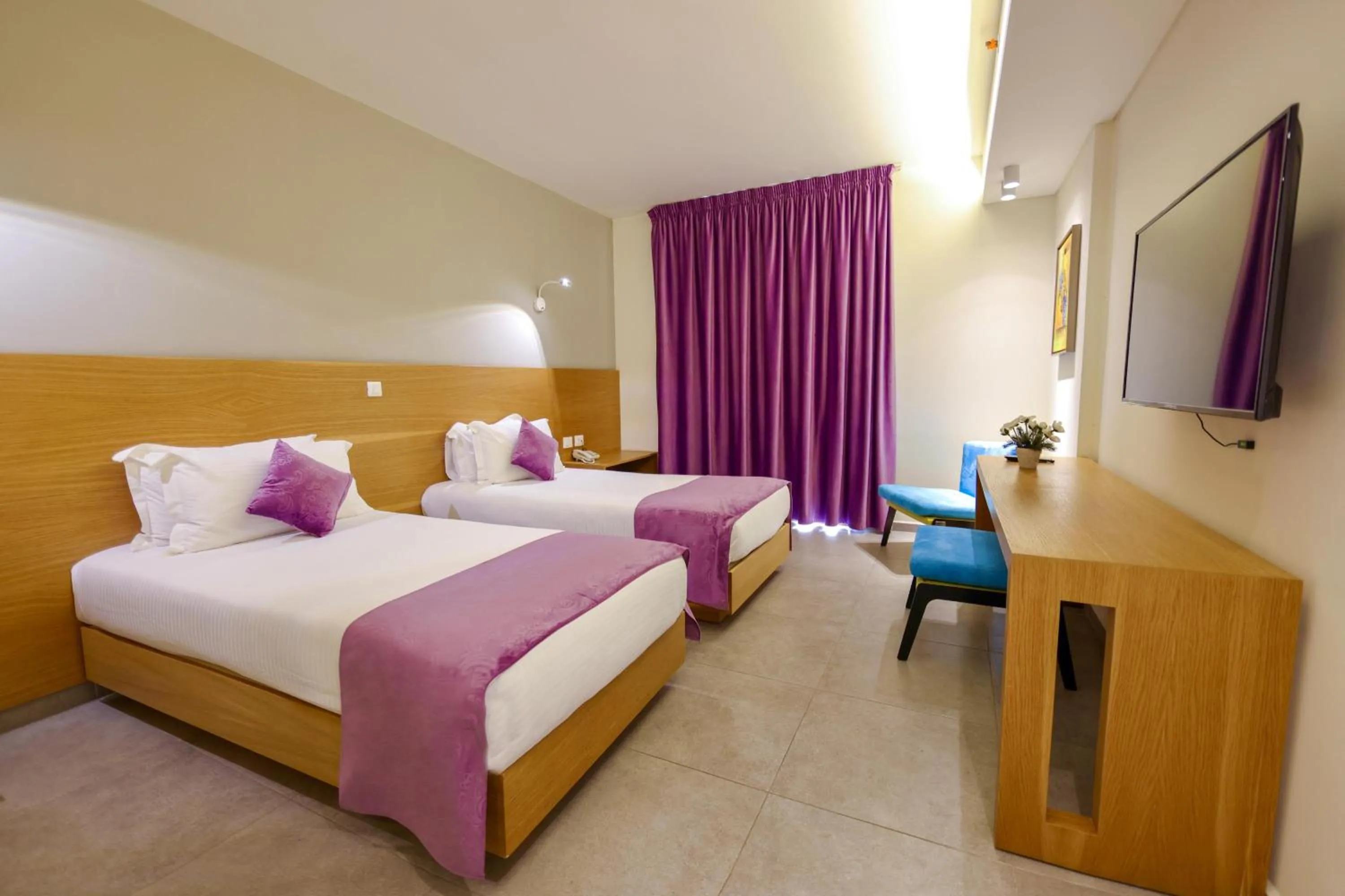 Bed in Majestic Byblos Grand Hotel