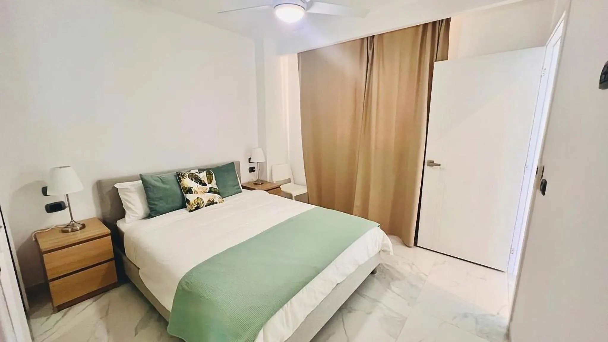 Bedroom, Bed in Luxury Apartment With Pool And Golf View