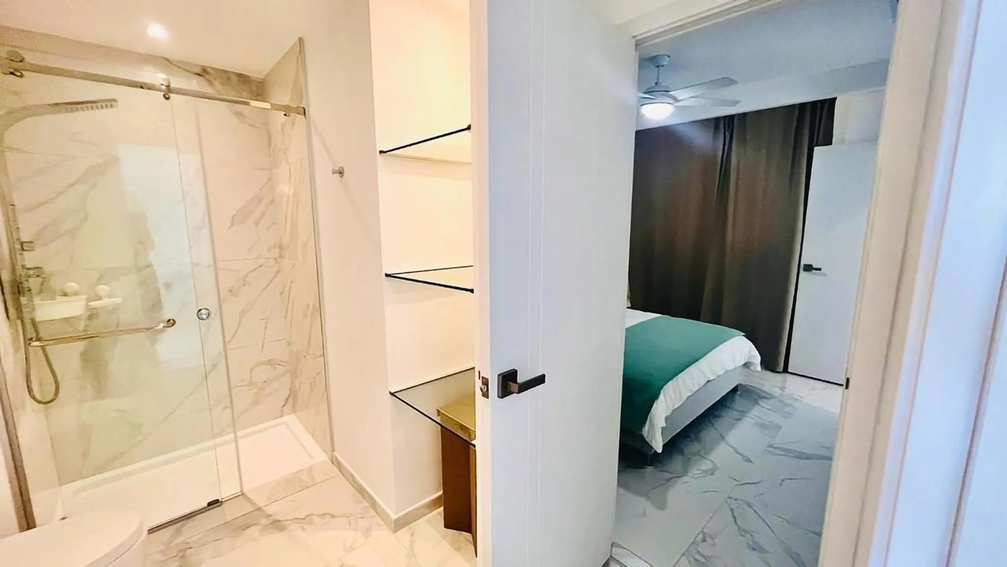 Shower in Luxury Apartment With Pool And Golf View