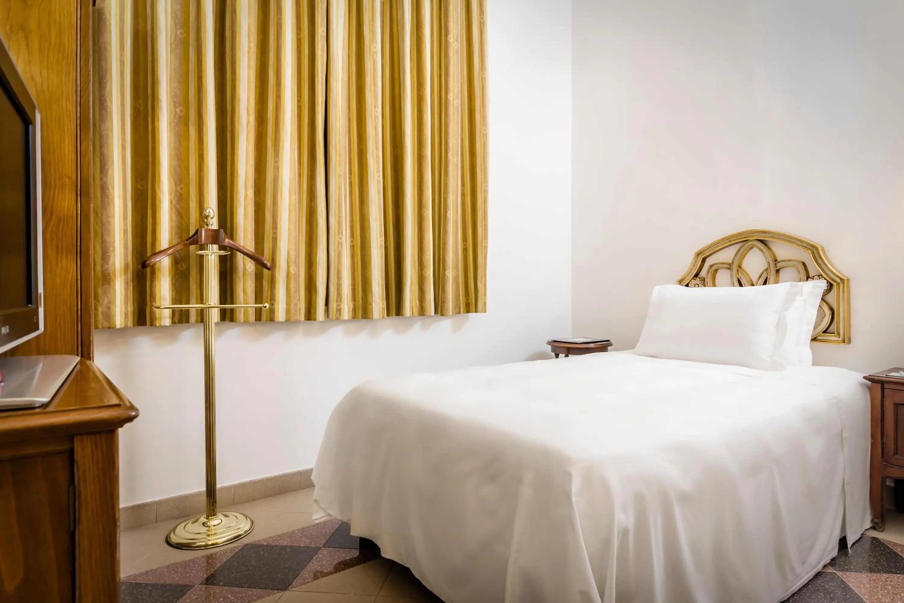 Bed in Eurostars Centrale Palace Hotel