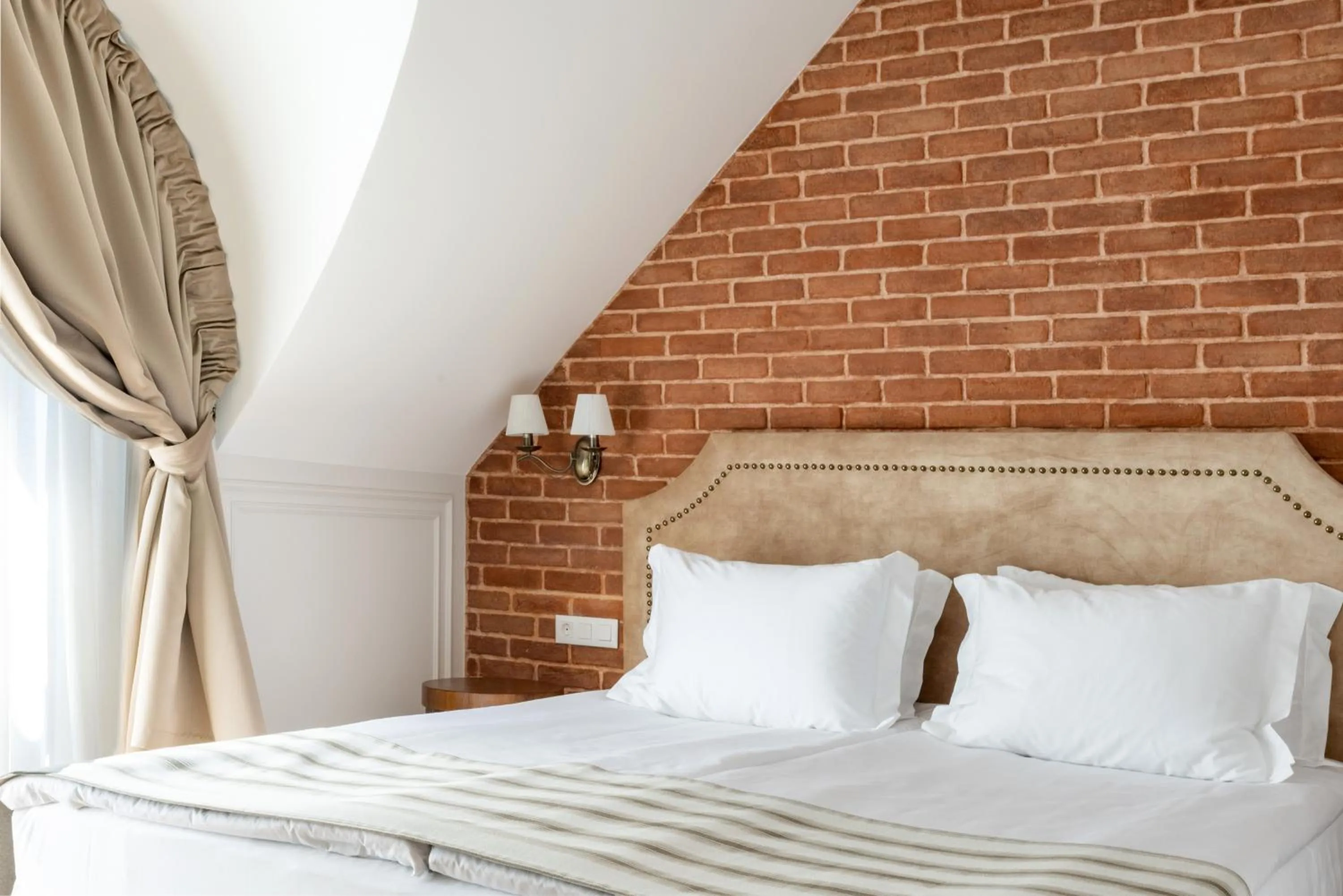 Bed in Villa Flavia Heritage Boutique Hotel