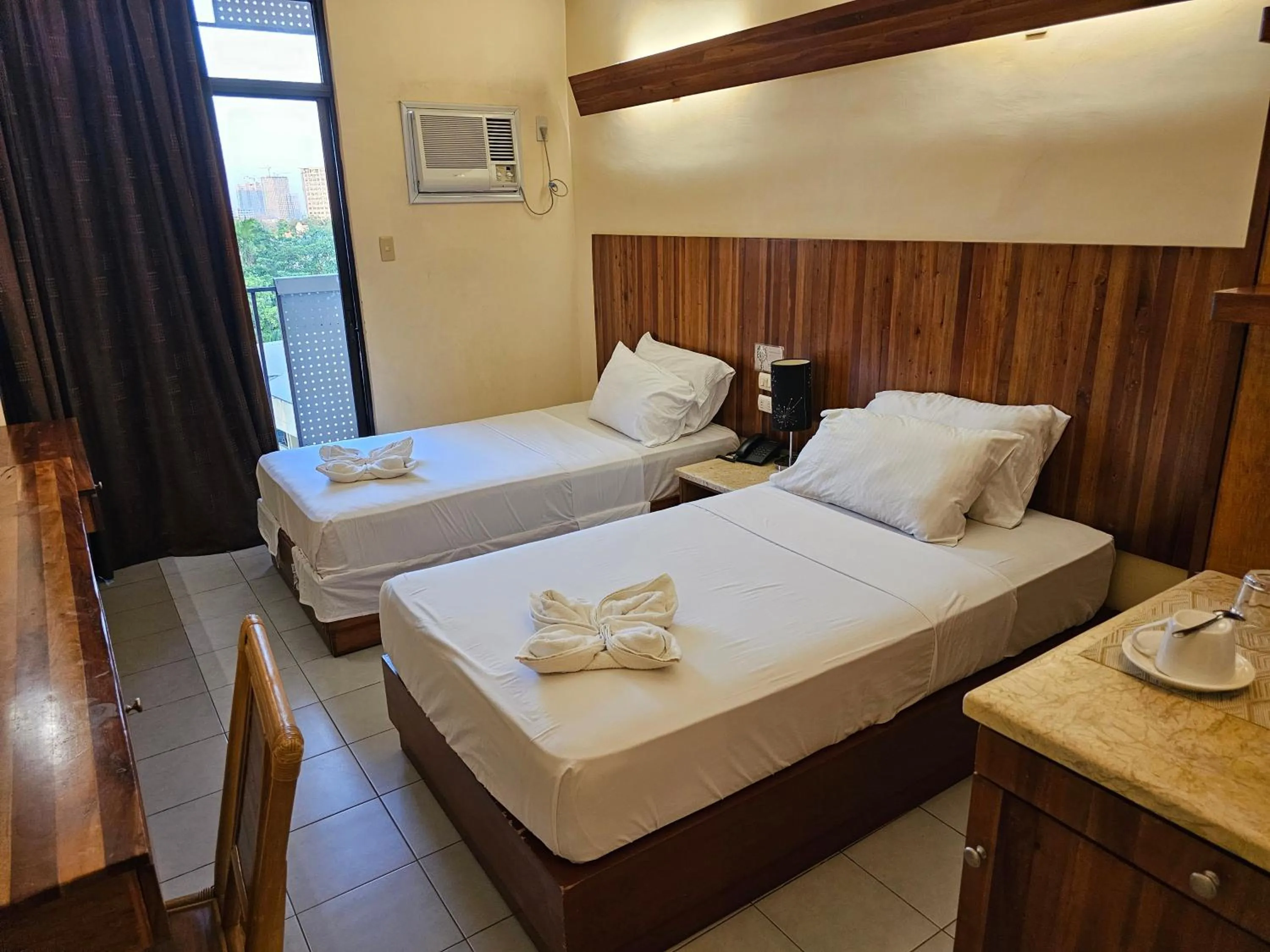 Bed in Tsai Hotel and Residences