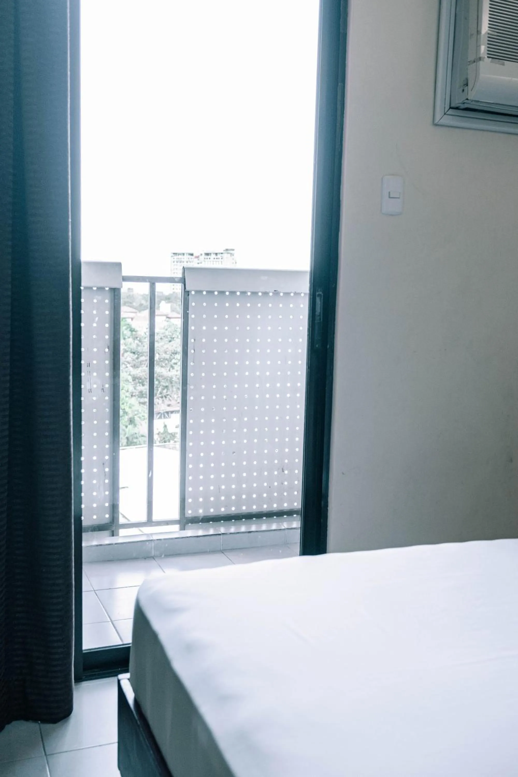 Bed in Tsai Hotel and Residences