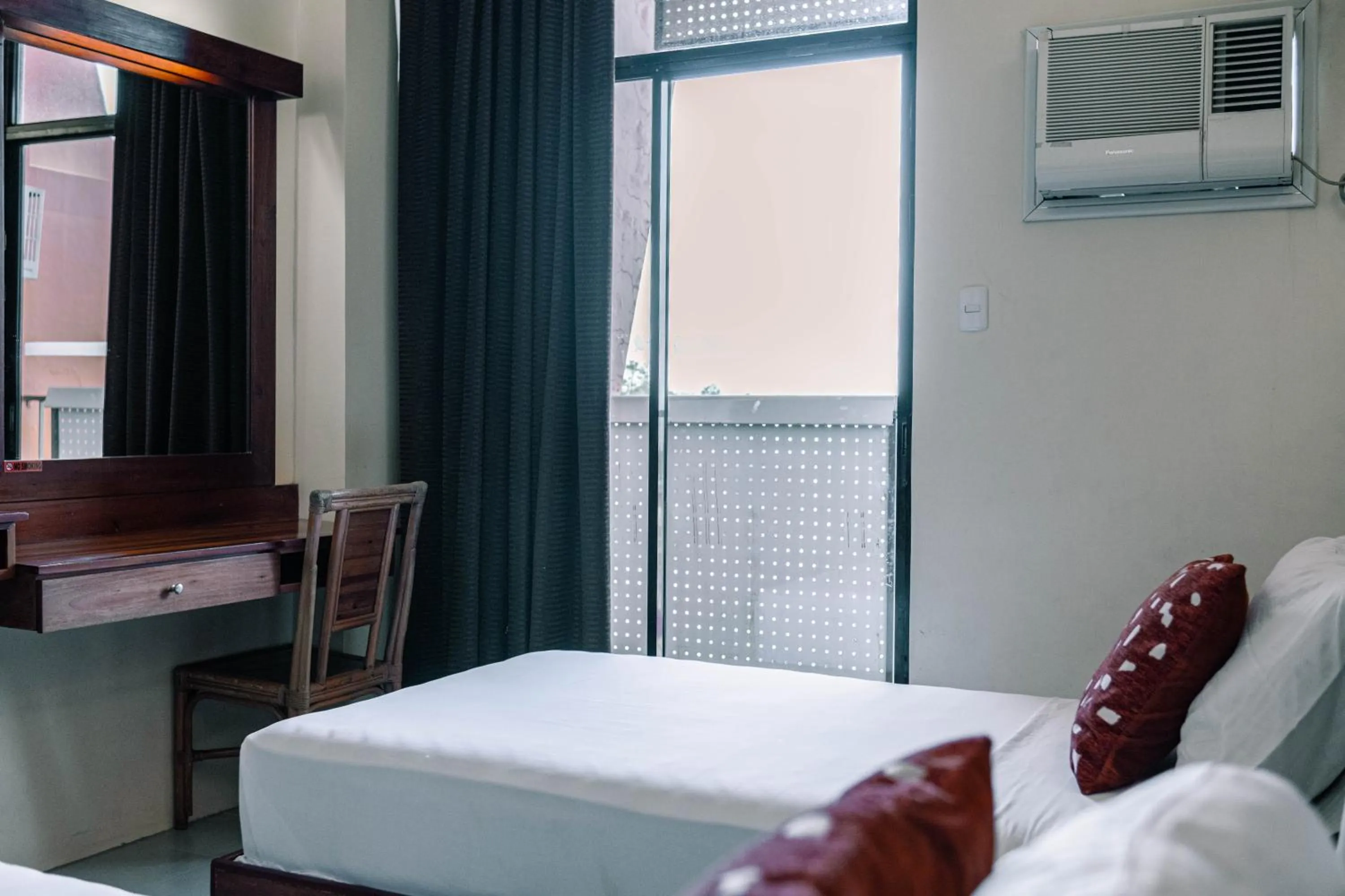 Bed in Tsai Hotel and Residences