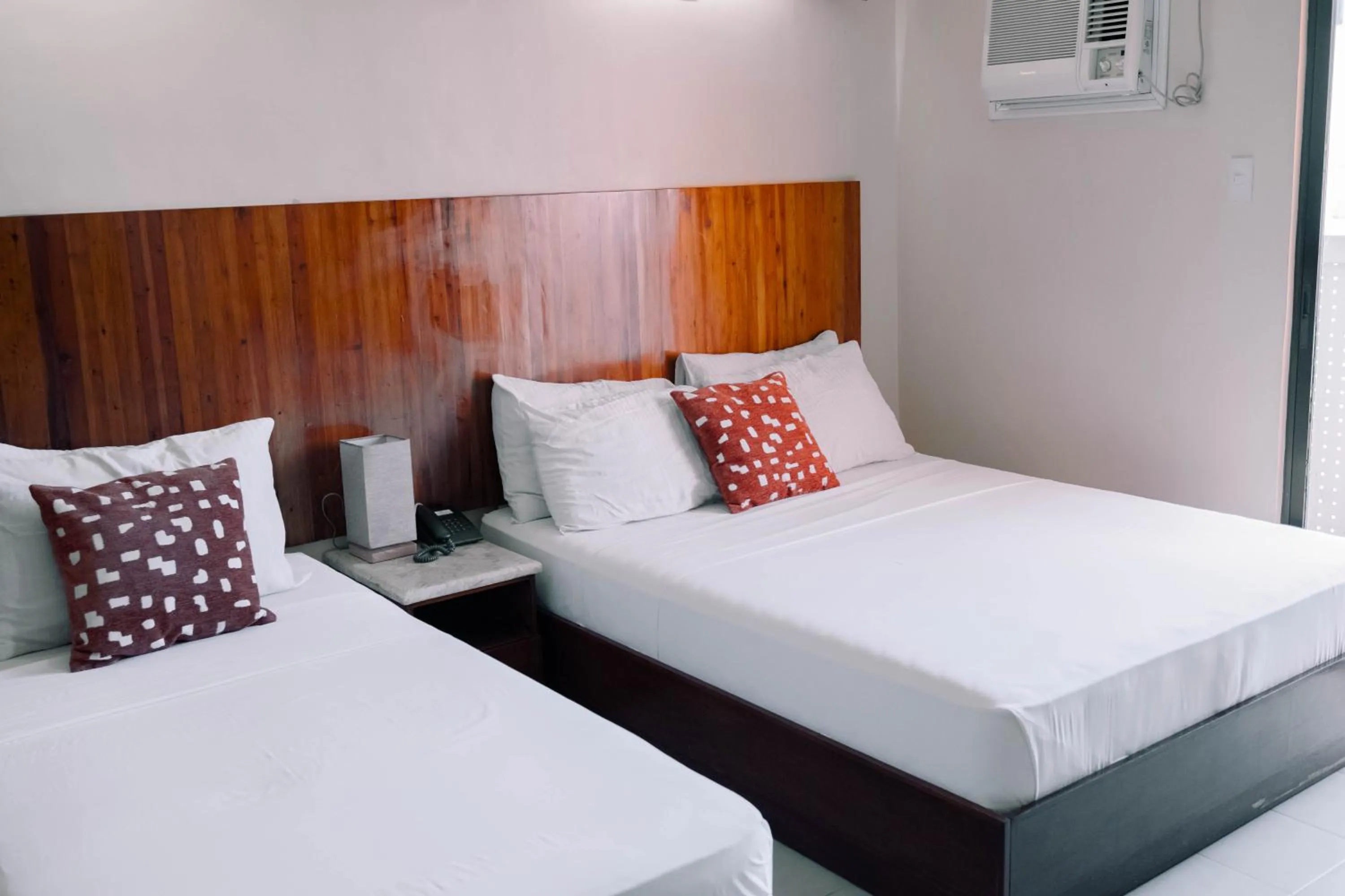 Bed in Tsai Hotel and Residences