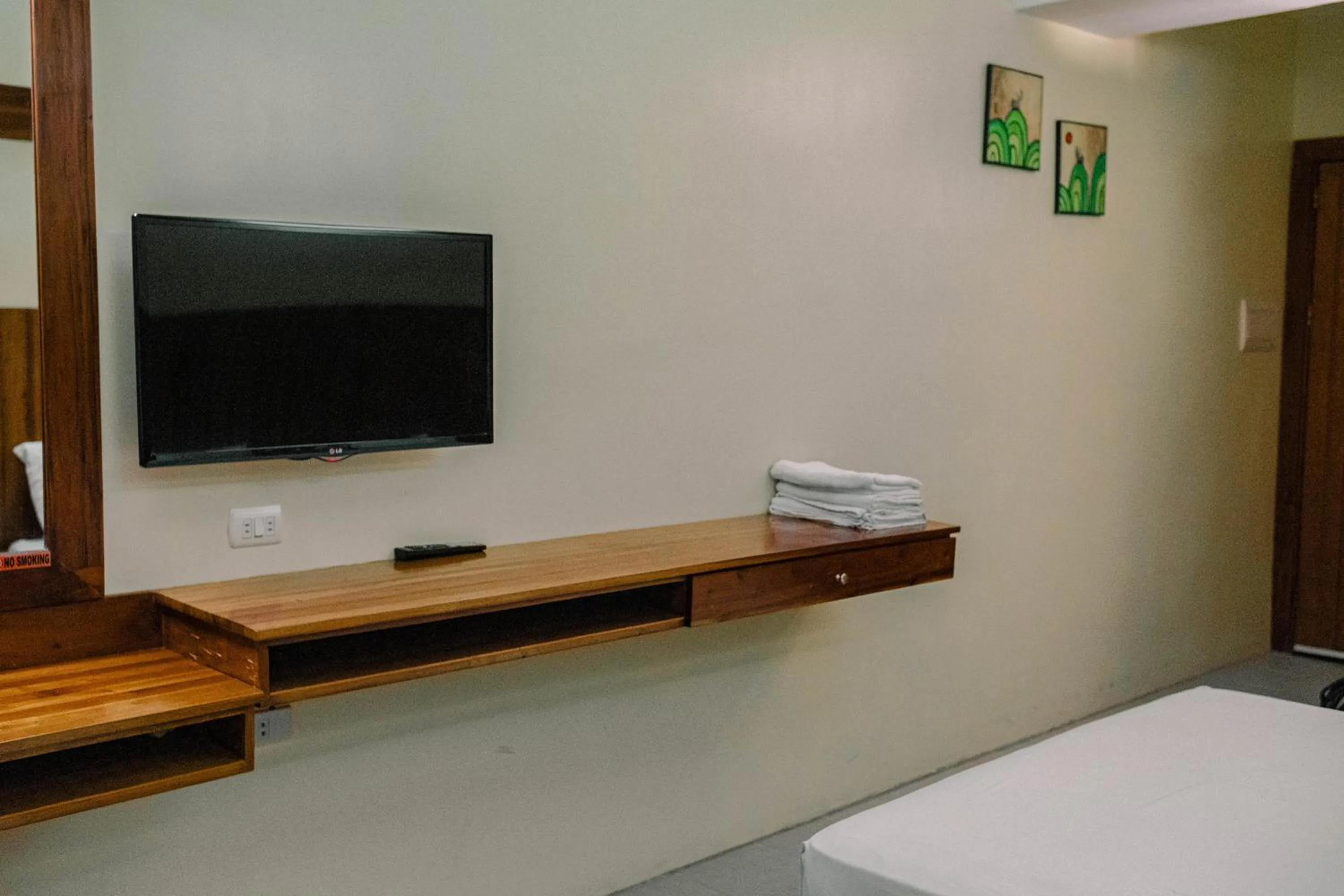 Bed in Tsai Hotel and Residences