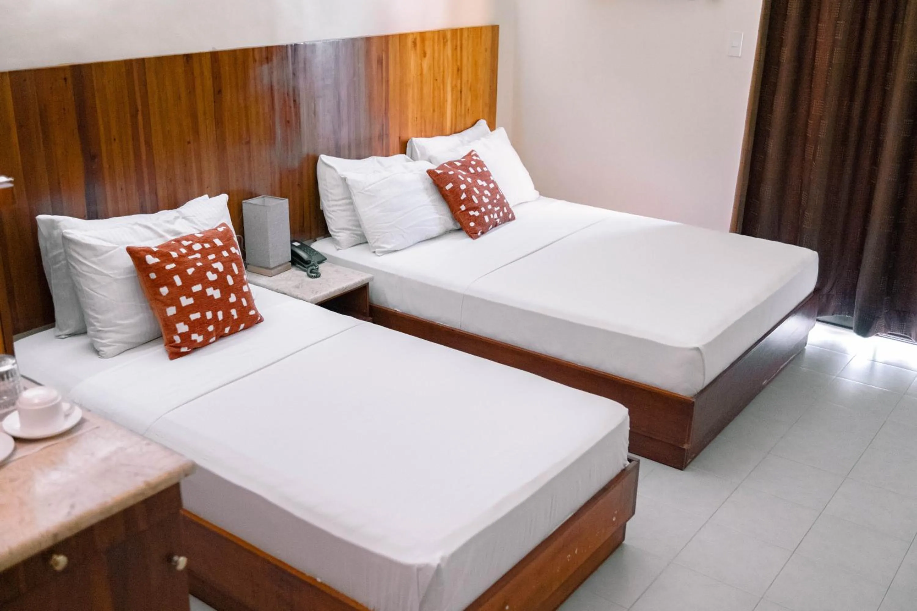 Bed in Tsai Hotel and Residences