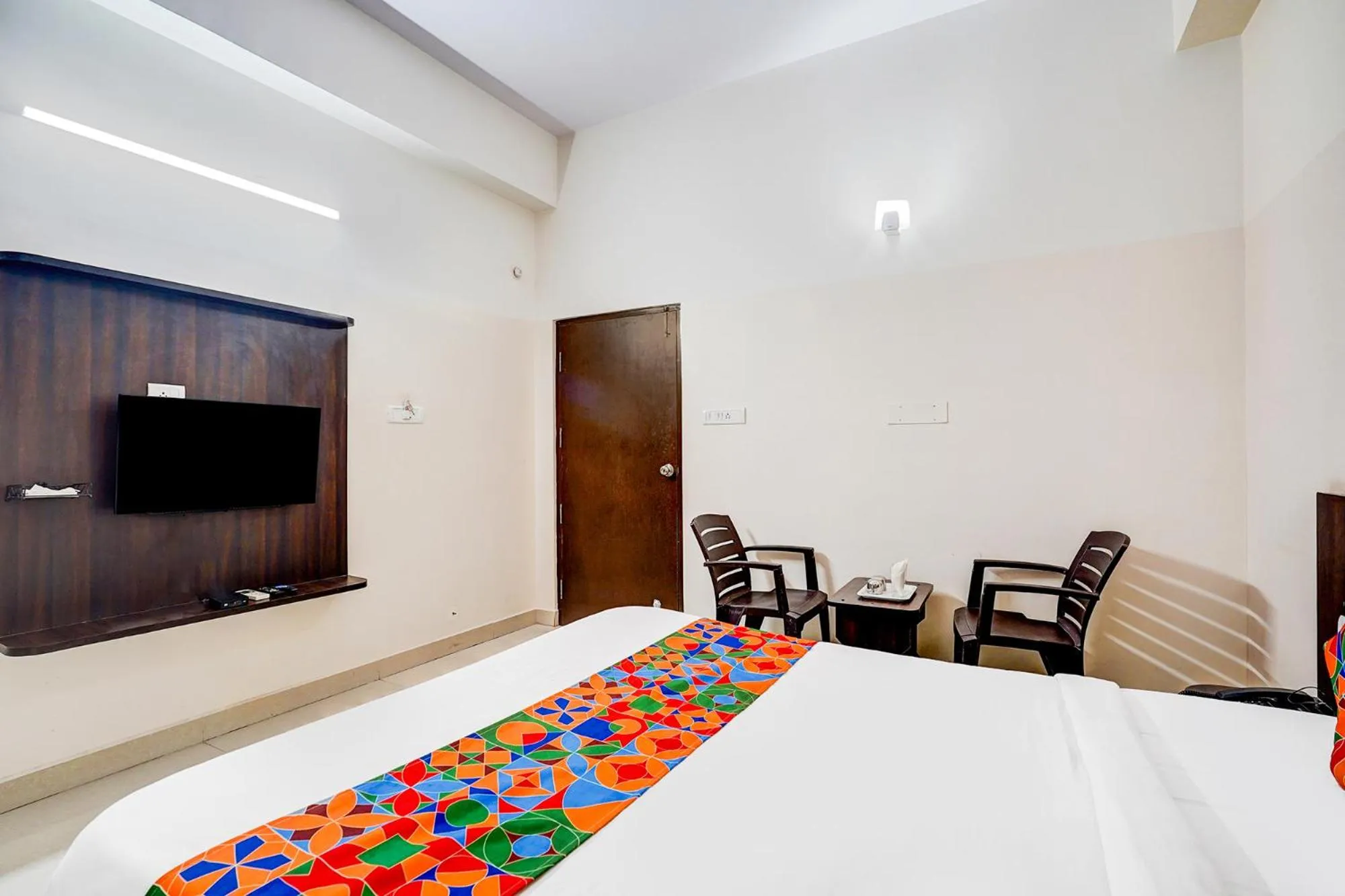 Bed in FabHotel Pride Image - Rajarajeshwari Nagar