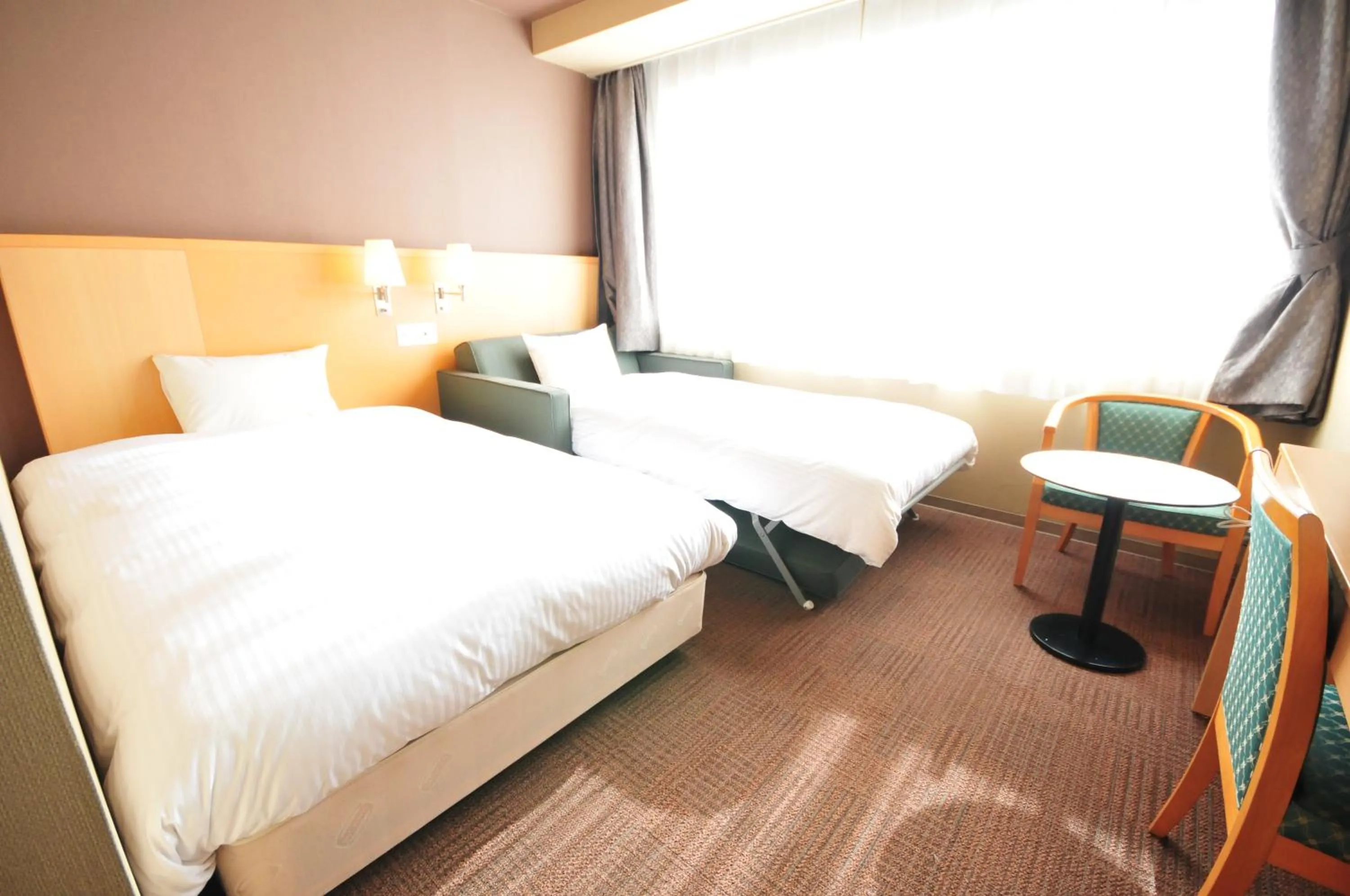 Bed in Hotel Premium Green Hills